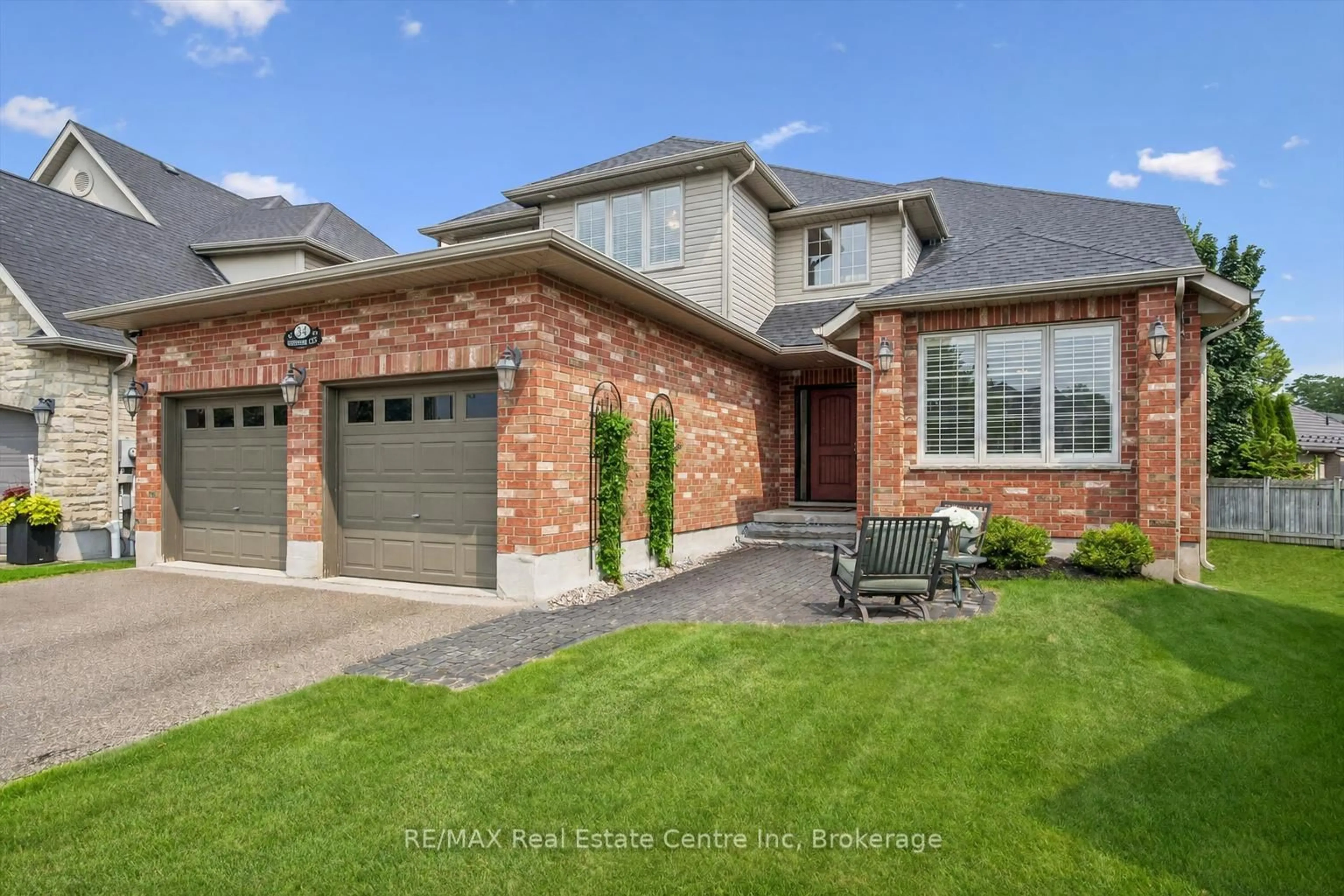 Home with brick exterior material, street for 34 Whetstone Cres, Guelph Ontario N1L 1T3