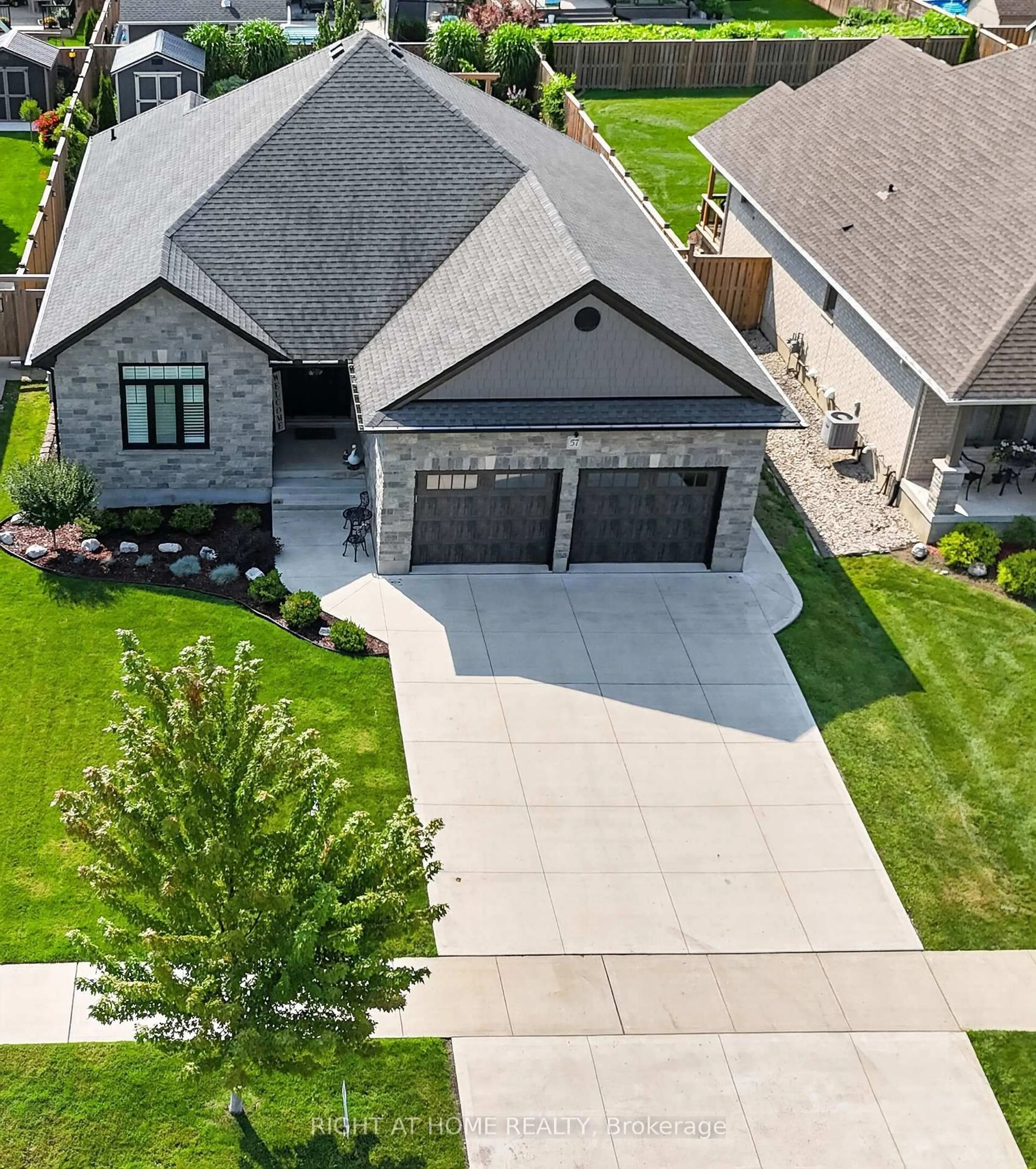 A pic from outside/outdoor area/front of a property/back of a property/a pic from drone, street for 57 Talbot Grove Lane, Southwold Ontario N5P 3T2