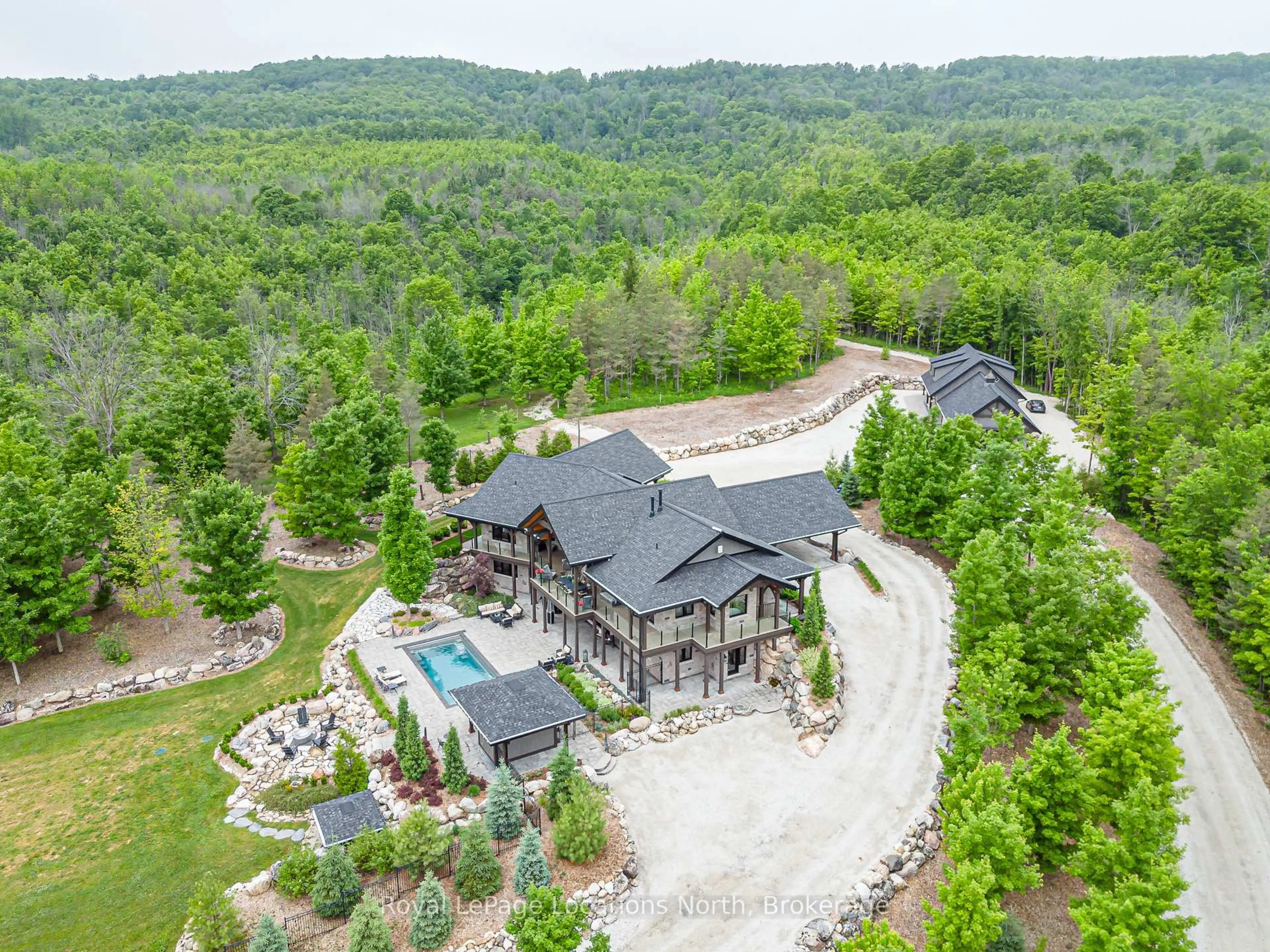 A pic from outside/outdoor area/front of a property/back of a property/a pic from drone, mountain view for 195718 Grey 7 Rd, Grey Highlands Ontario N0C 1G0