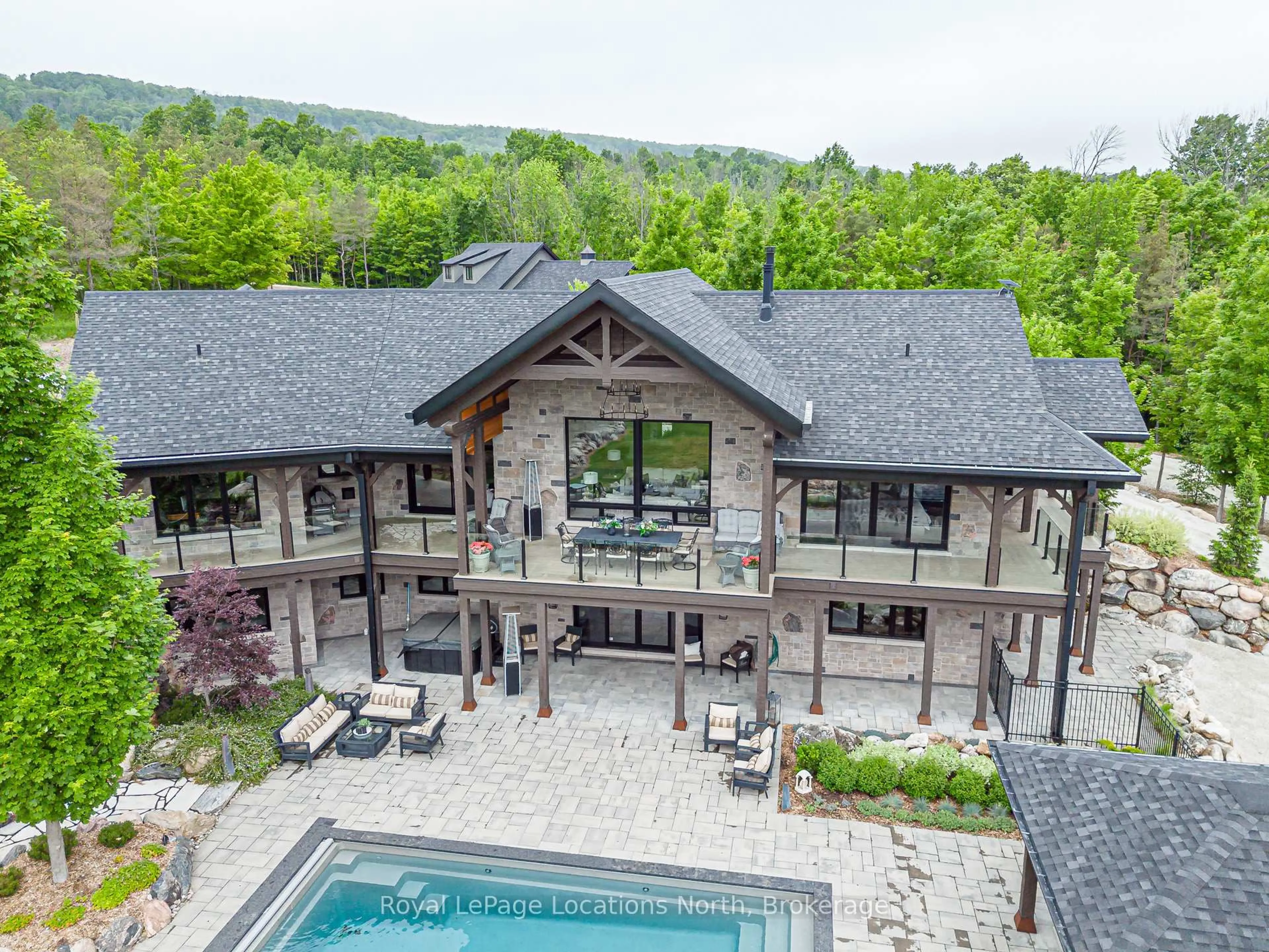 A pic from outside/outdoor area/front of a property/back of a property/a pic from drone, mountain view for 195718 Grey 7 Rd, Grey Highlands Ontario N0C 1G0