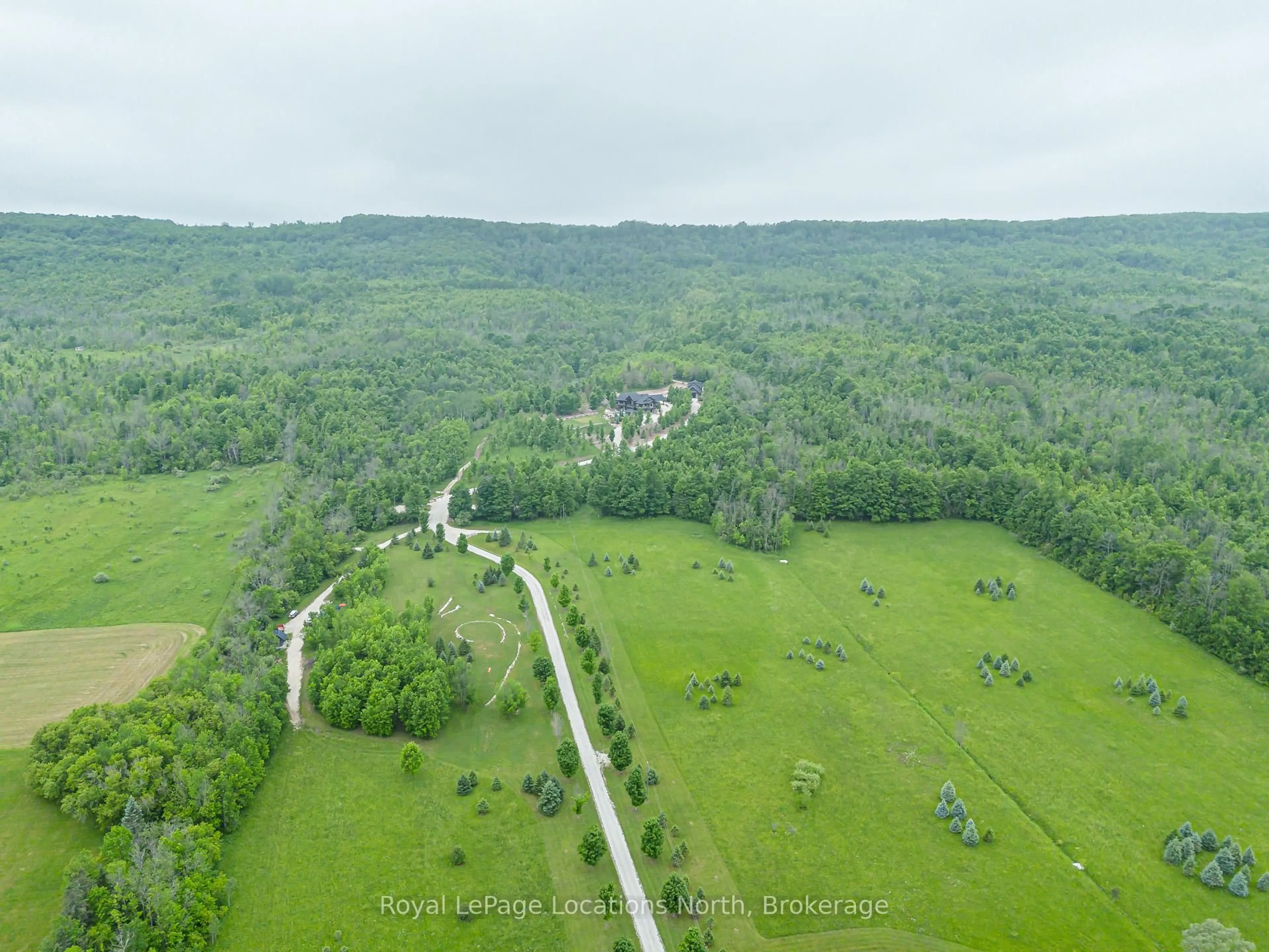 A pic from outside/outdoor area/front of a property/back of a property/a pic from drone, forest/trees view for 195718 Grey 7 Rd, Grey Highlands Ontario N0C 1G0