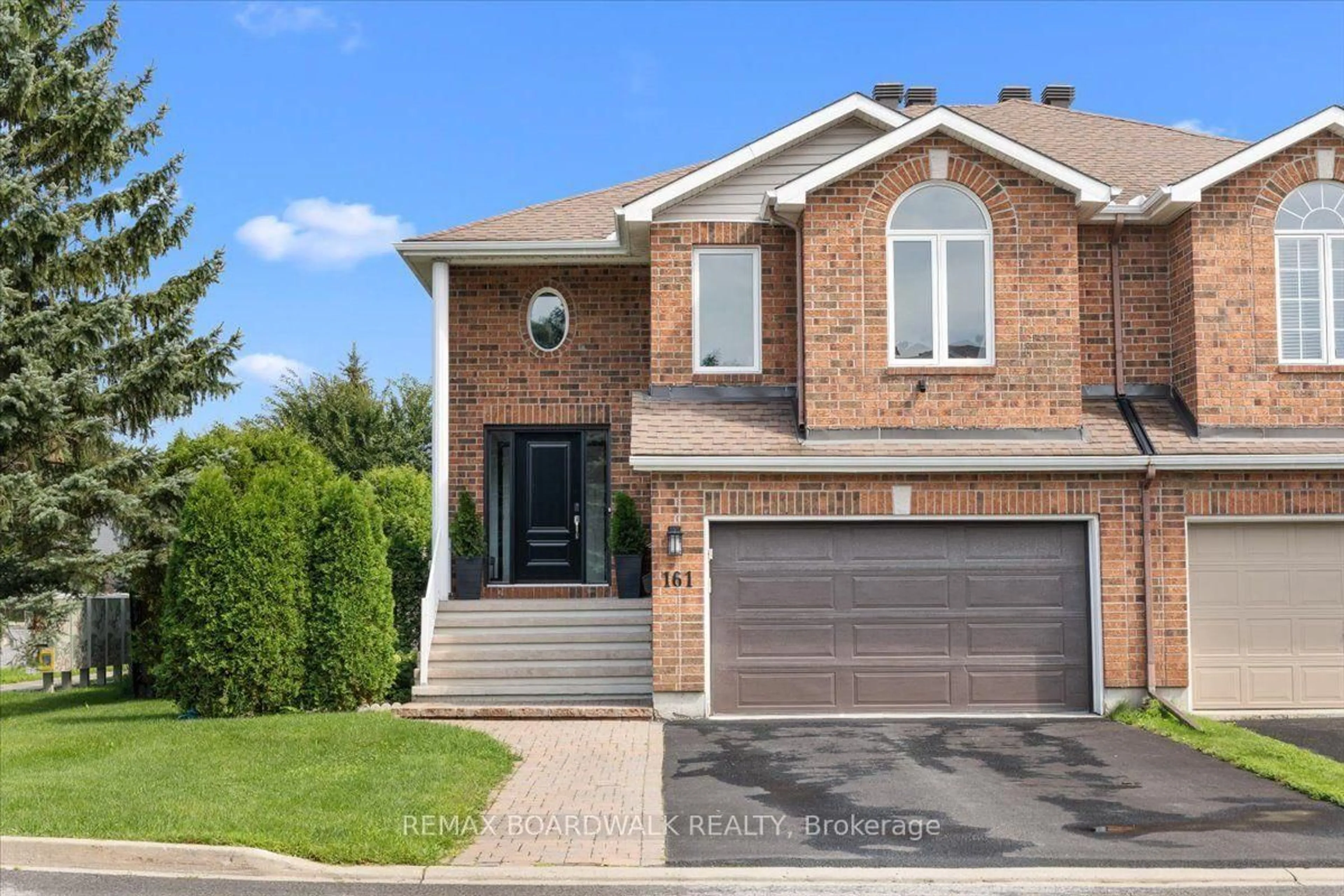 Home with brick exterior material, street for 161 Castle Glen Cres, Ottawa Ontario K2L 4G9