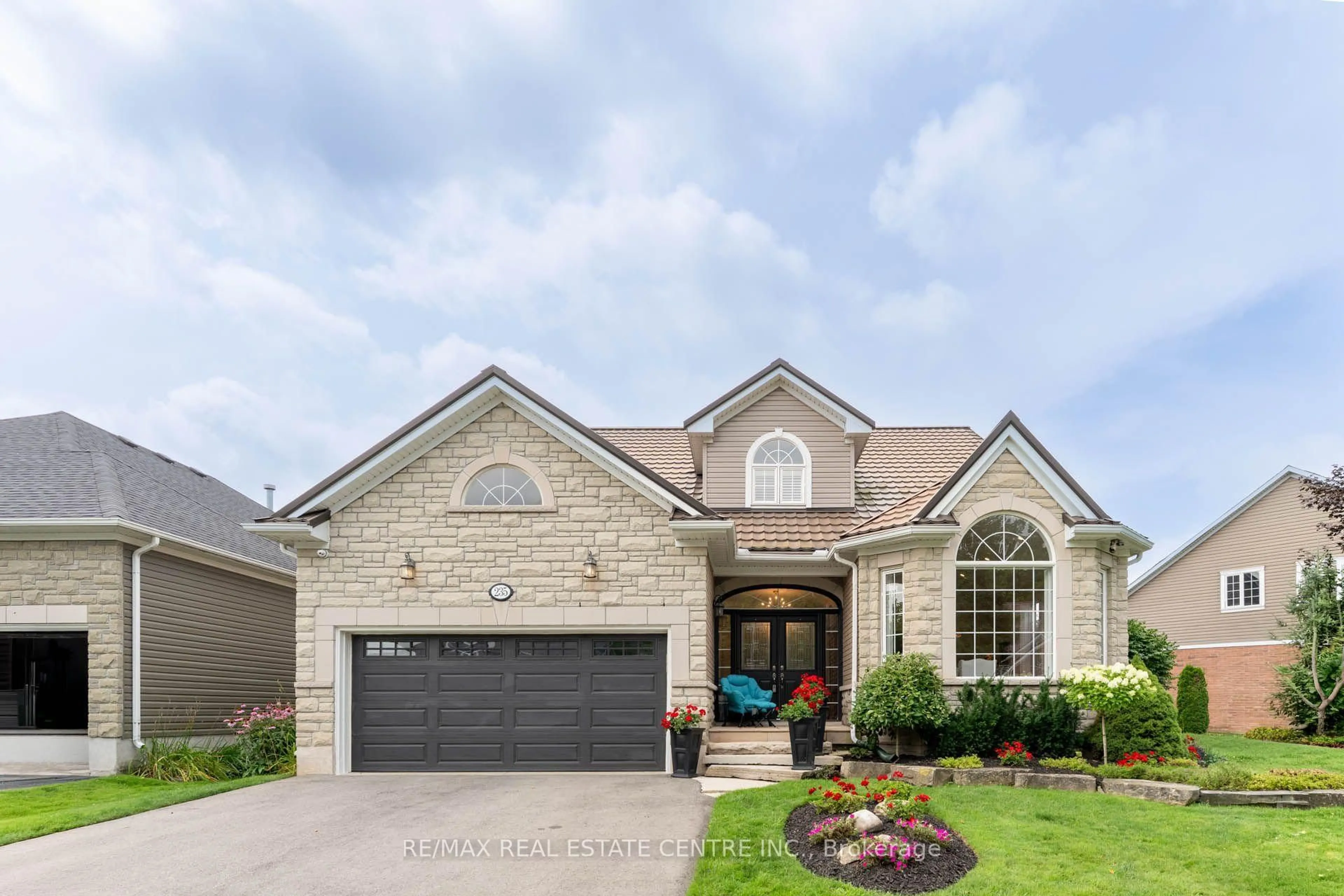 Home with brick exterior material, street for 235 Ridge Rd, Guelph/Eramosa Ontario N0B 2K0