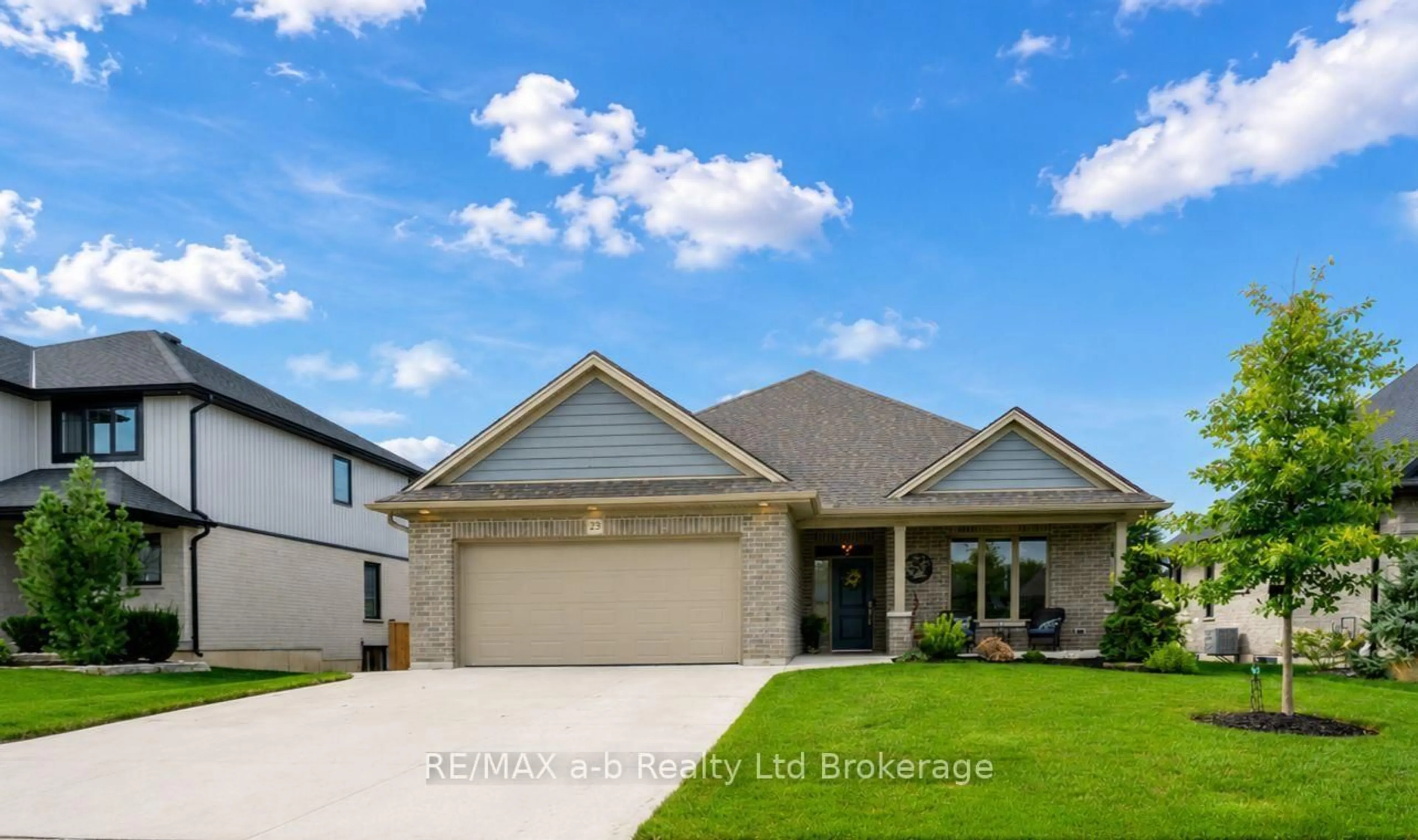 Home with brick exterior material, street for 23 BROOKSIDE Lane, Tillsonburg Ontario N4G 0A1
