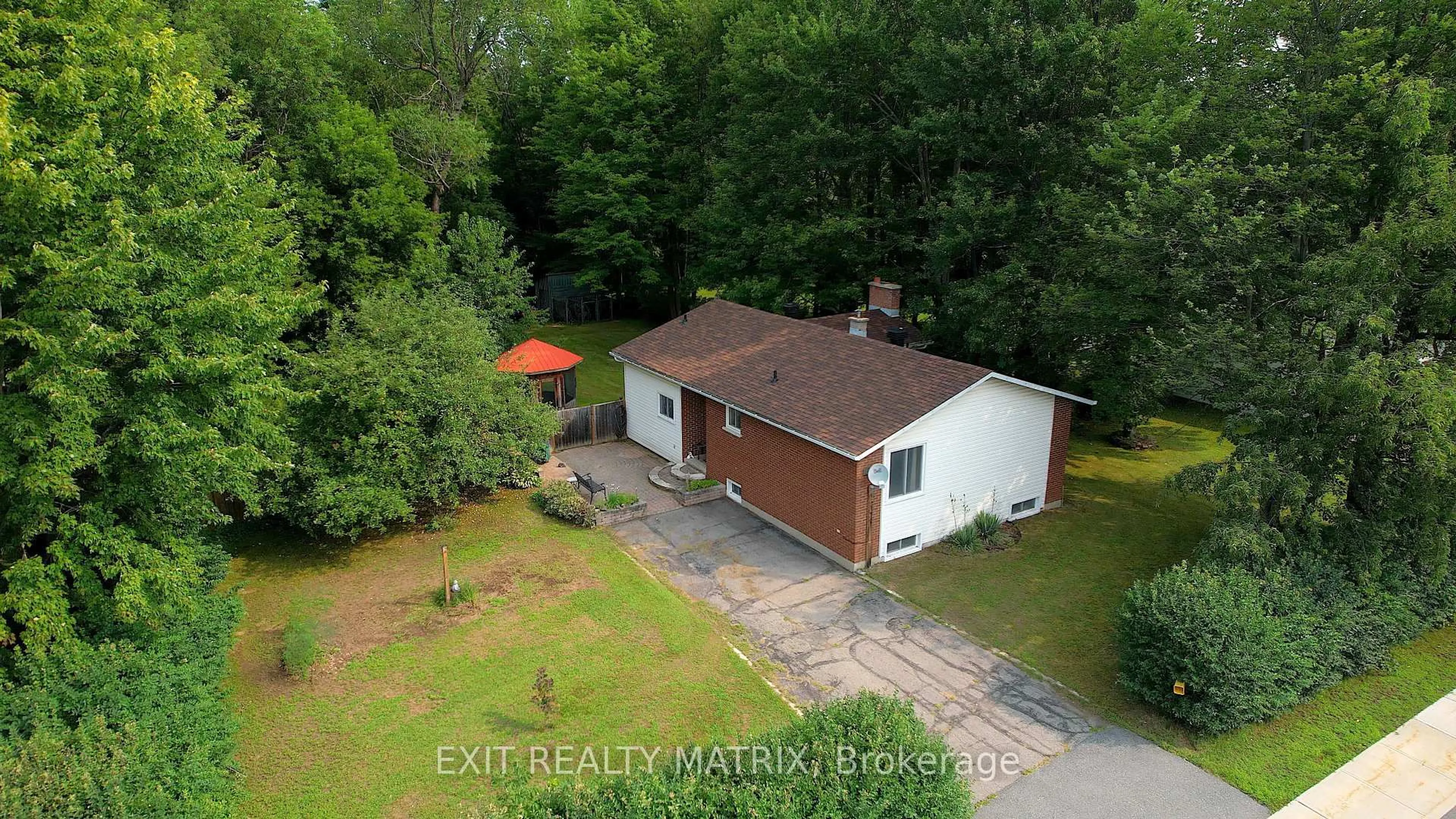 A pic from outside/outdoor area/front of a property/back of a property/a pic from drone, water/lake/river/ocean view for 2174 Des Pins St, The Nation Ontario K4R 1C5