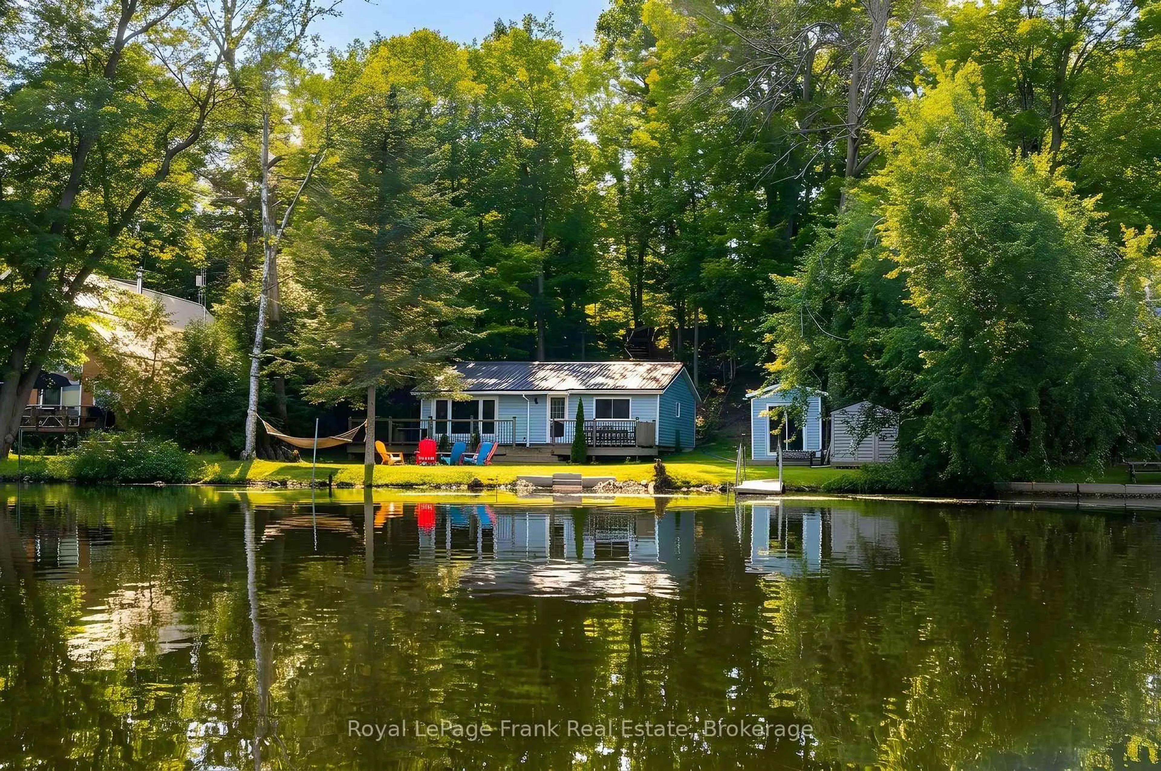 A pic from outside/outdoor area/front of a property/back of a property/a pic from drone, water/lake/river/ocean view for 744D Marble Point Rd, Limoges Ontario K0K 2M0