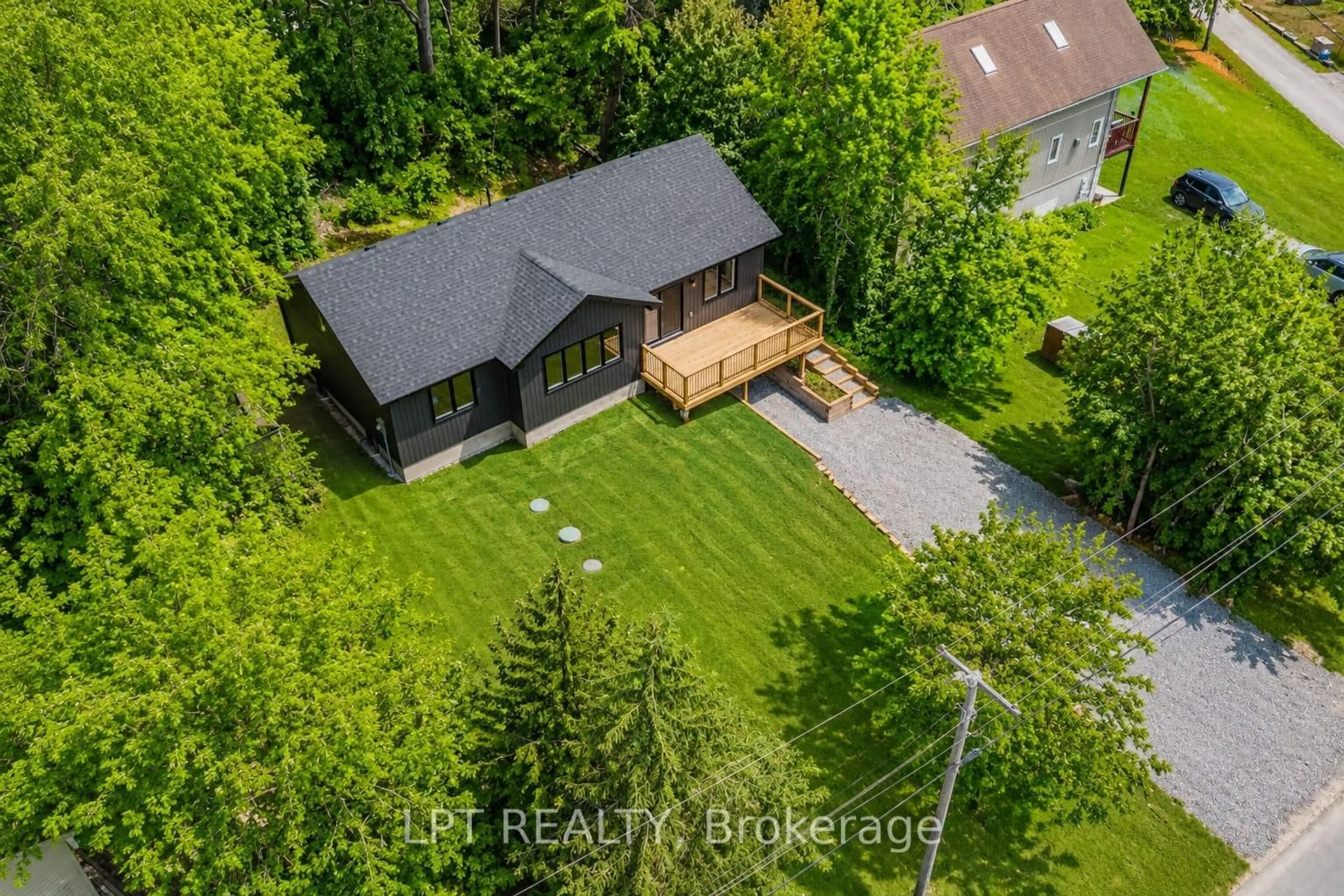 A pic from outside/outdoor area/front of a property/back of a property/a pic from drone, forest/trees view for 29 Pavillion Rd, Kawartha Lakes Ontario K0M 1L0