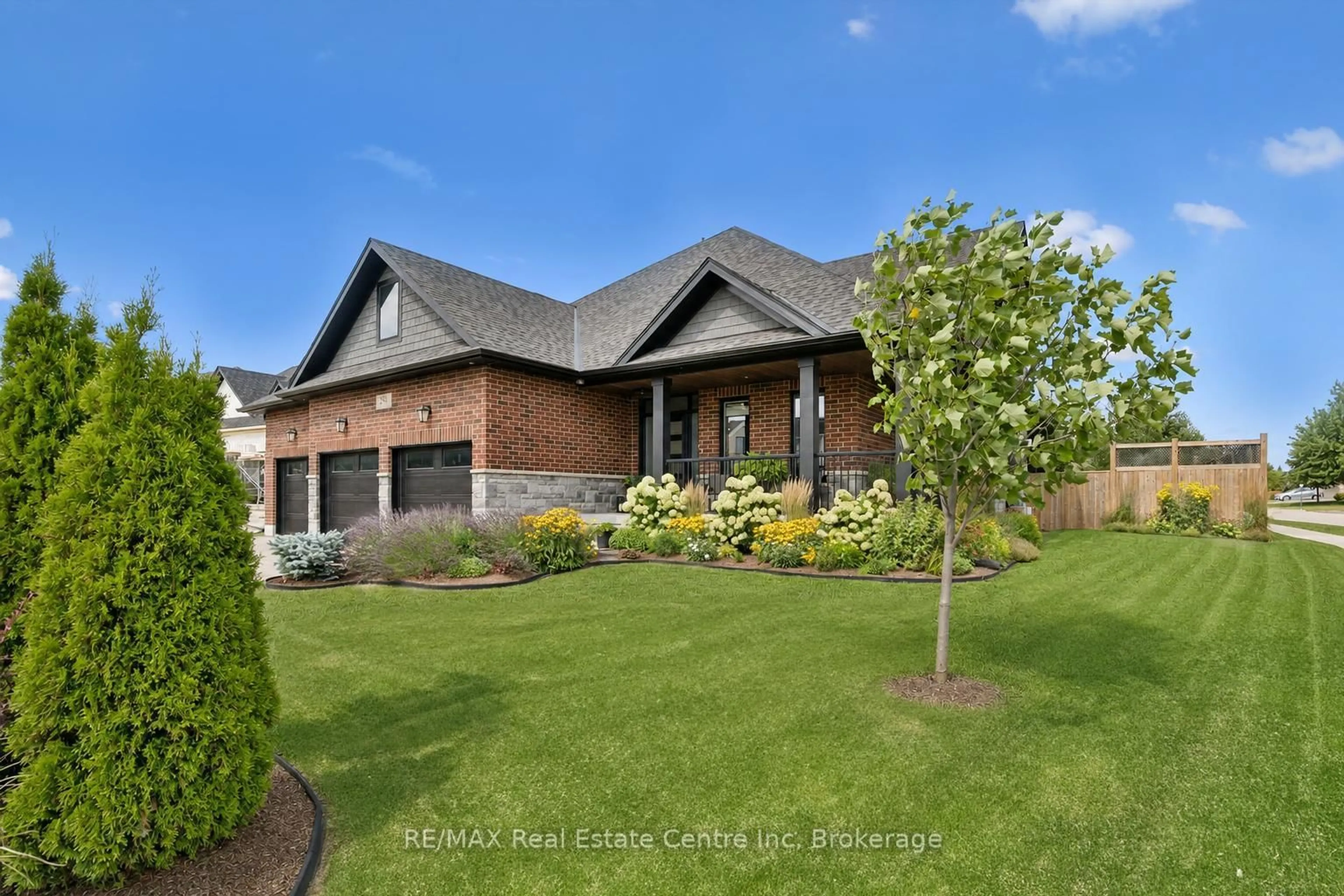 Home with brick exterior material, street for 58 Carriage Crossing, Mapleton Ontario N0G 1P0