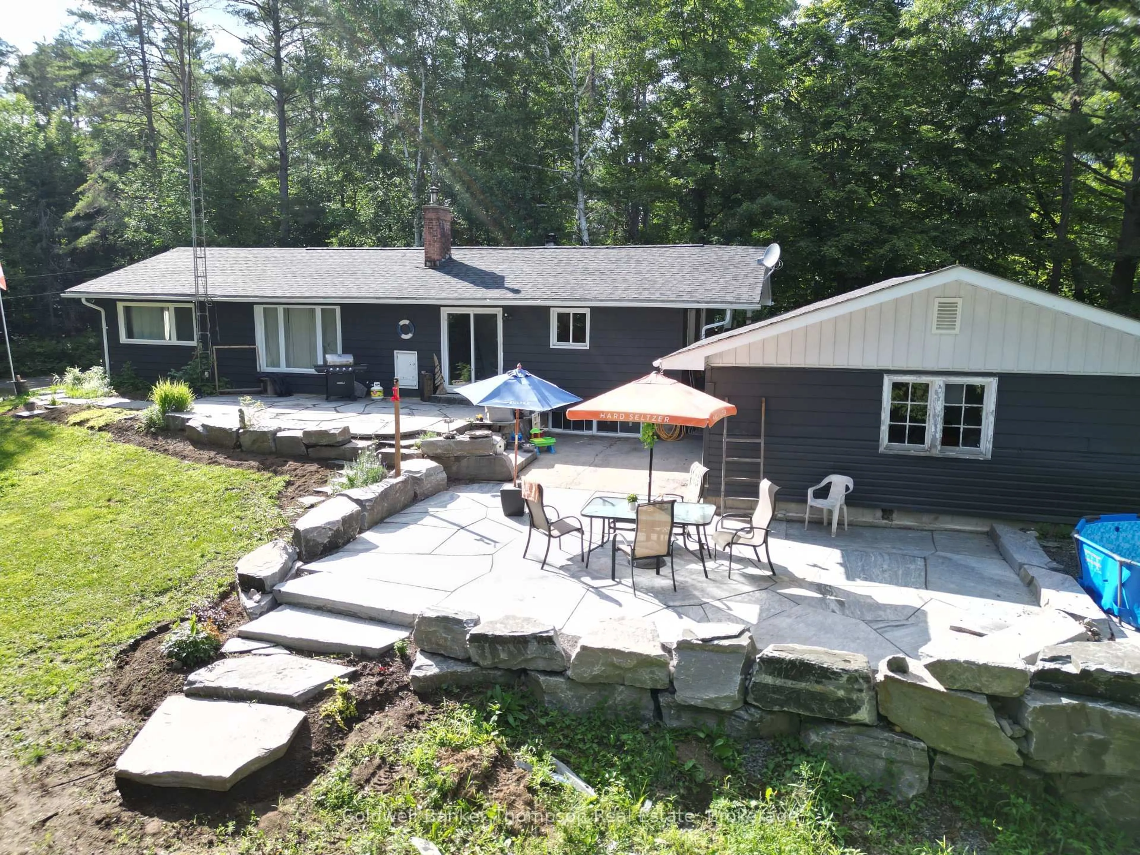 A pic from outside/outdoor area/front of a property/back of a property/a pic from drone, mountain view for 21 Ripple & Palette Lake Rd, Huntsville Ontario P1H 2J4