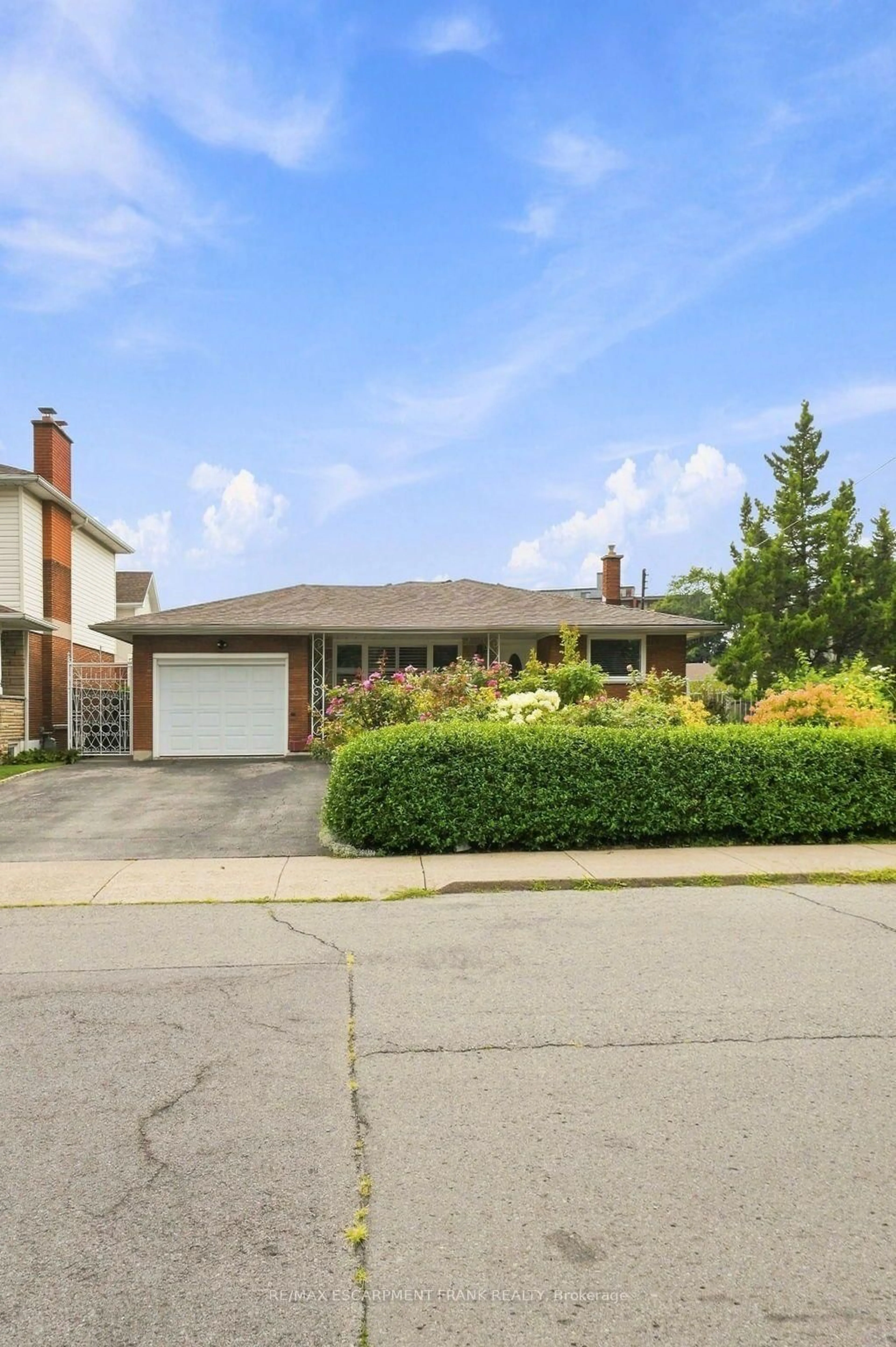 Home with brick exterior material, street for 76 Orphir Rd, Hamilton Ontario L8K 3Z4