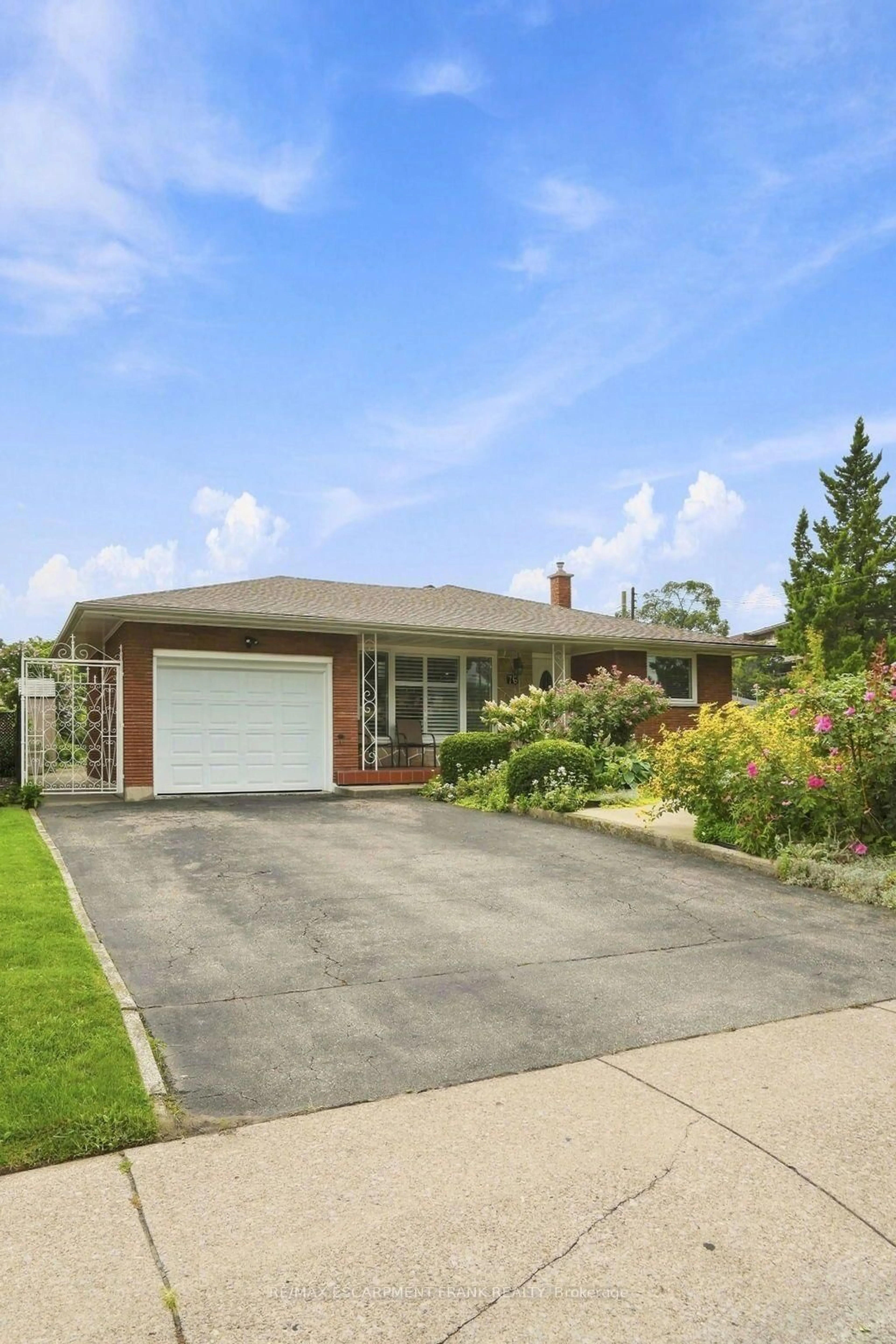 Home with brick exterior material, street for 76 Orphir Rd, Hamilton Ontario L8K 3Z4
