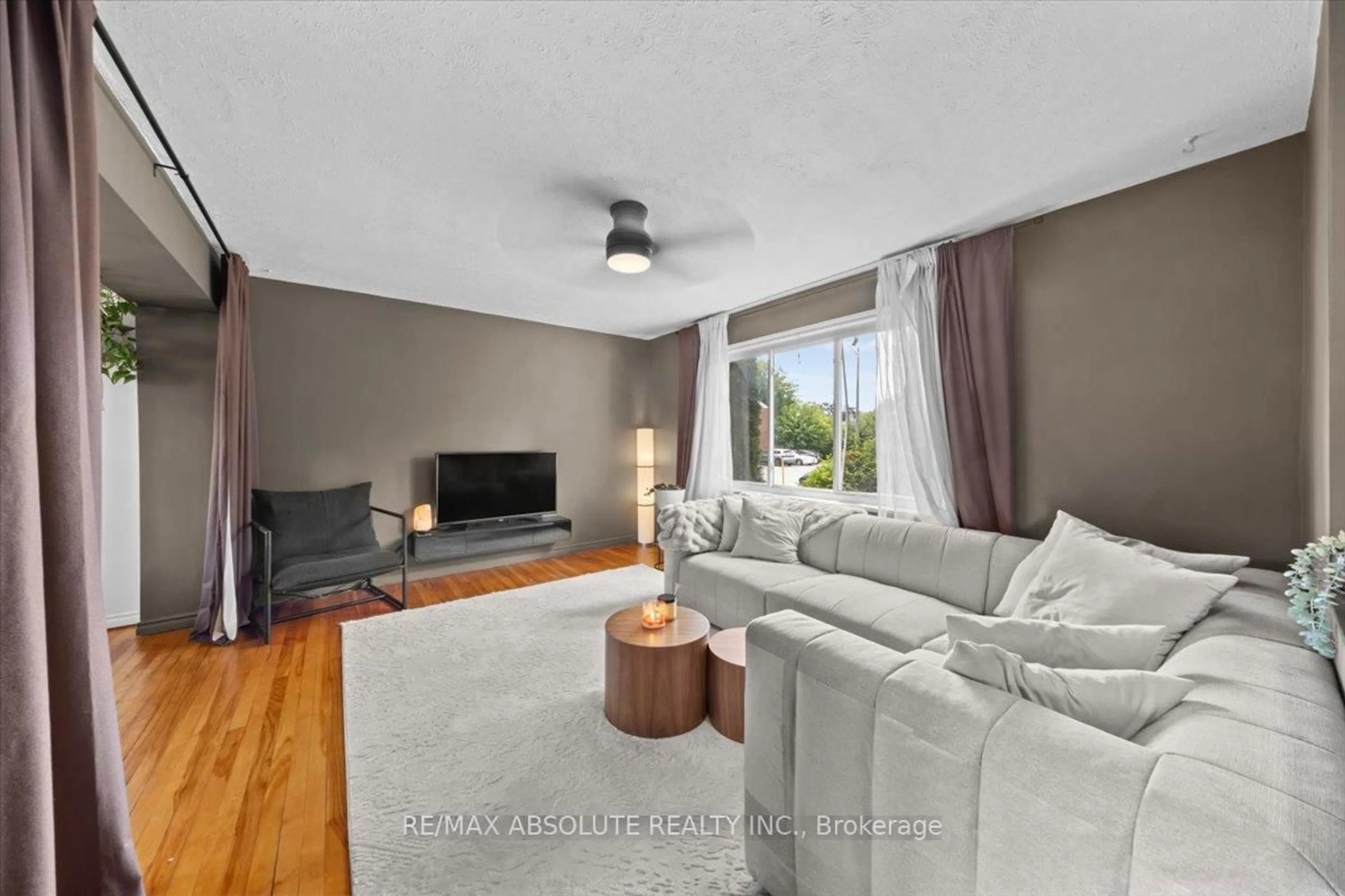 Living room with furniture, unknown for 791 Borthwick Ave, Ottawa Ontario K1K 2M5