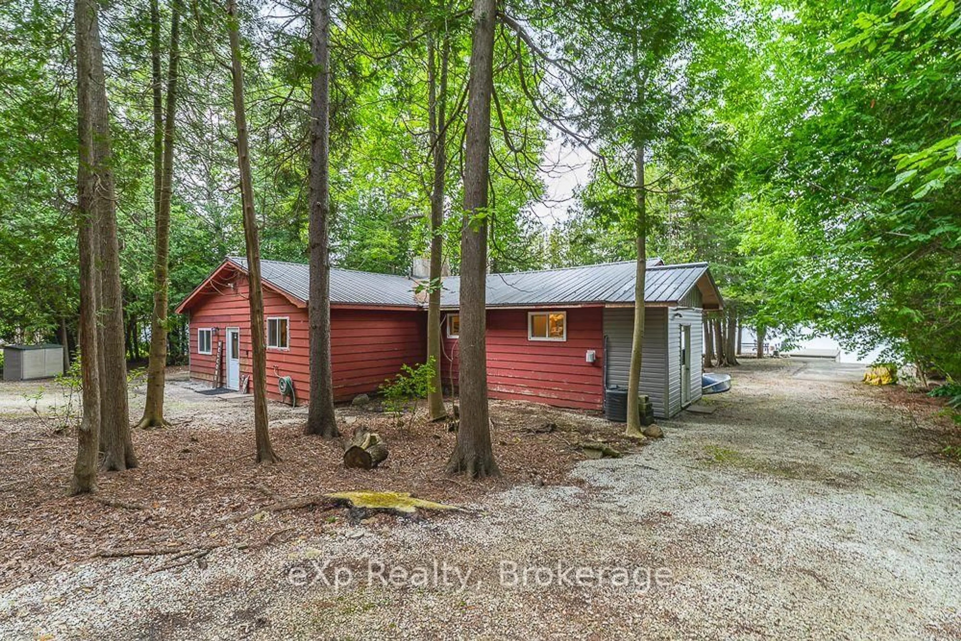 A pic from outside/outdoor area/front of a property/back of a property/a pic from drone, forest/trees view for 163 Mallard St, Georgian Bluffs Ontario N0H 2T0