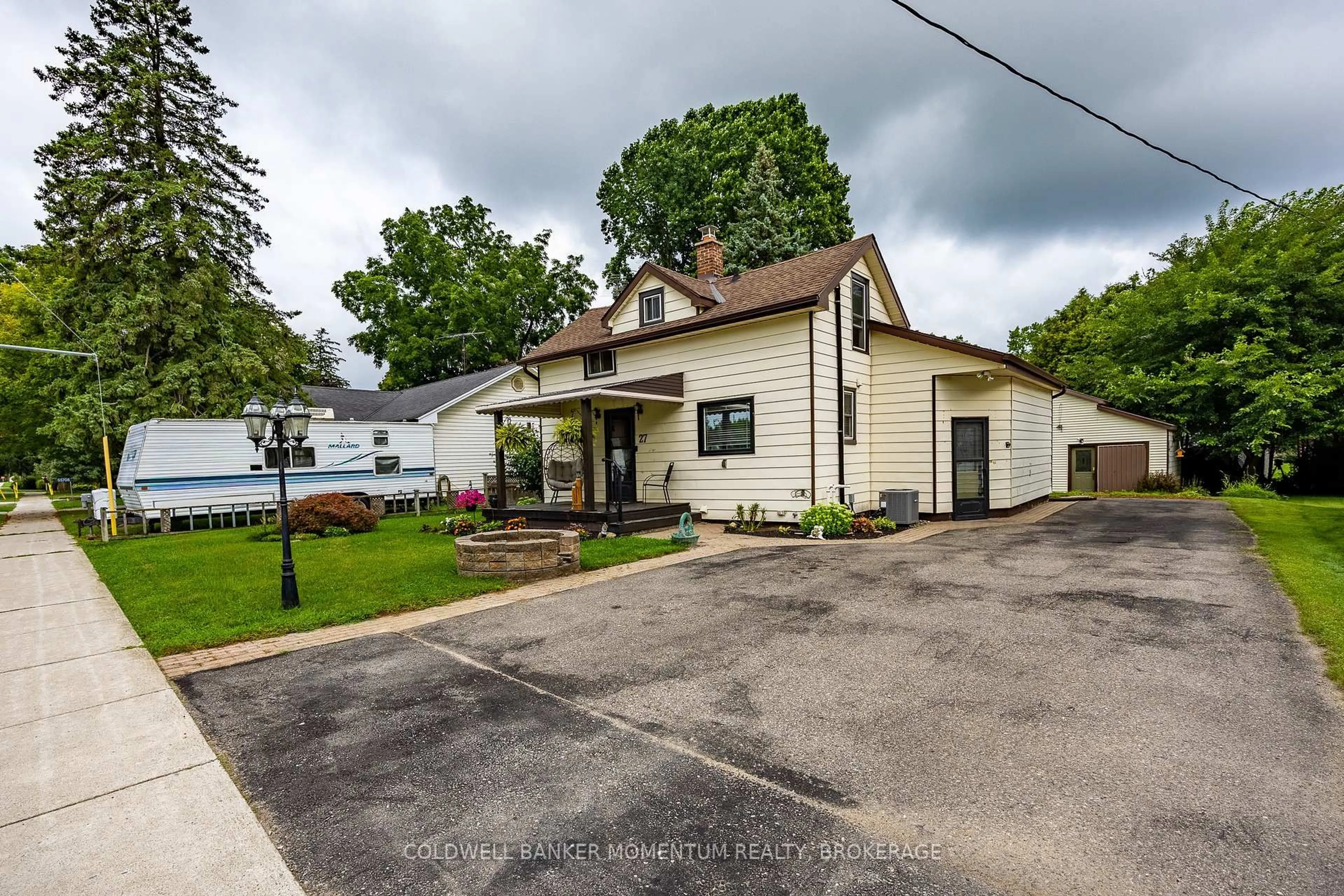 A pic from outside/outdoor area/front of a property/back of a property/a pic from drone, street for 55716 Main St, Bayham Ontario N0J 1Y0