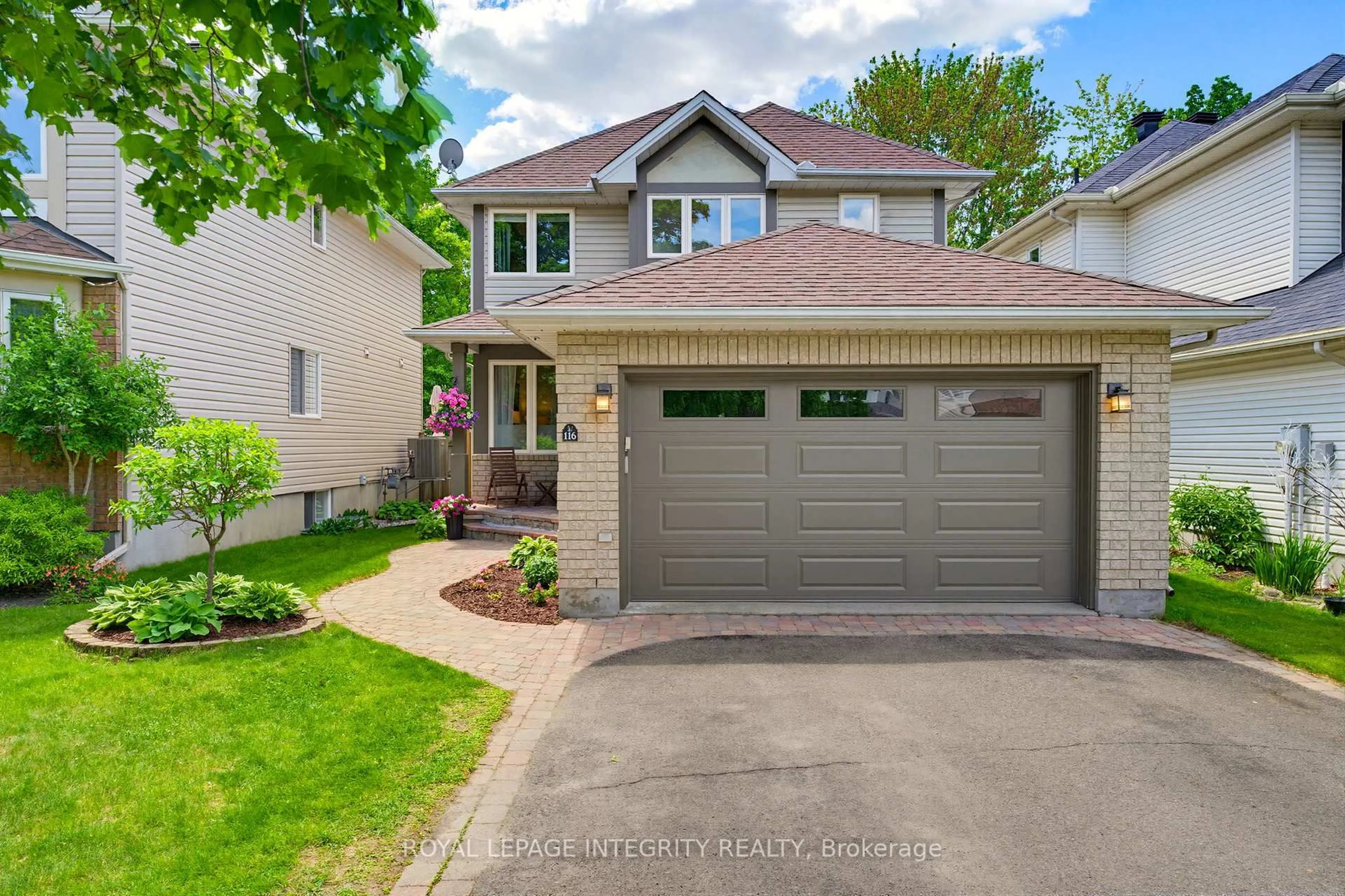 Home with brick exterior material, street for 116 Springcreek Cres, Ottawa Ontario K2M 2K8