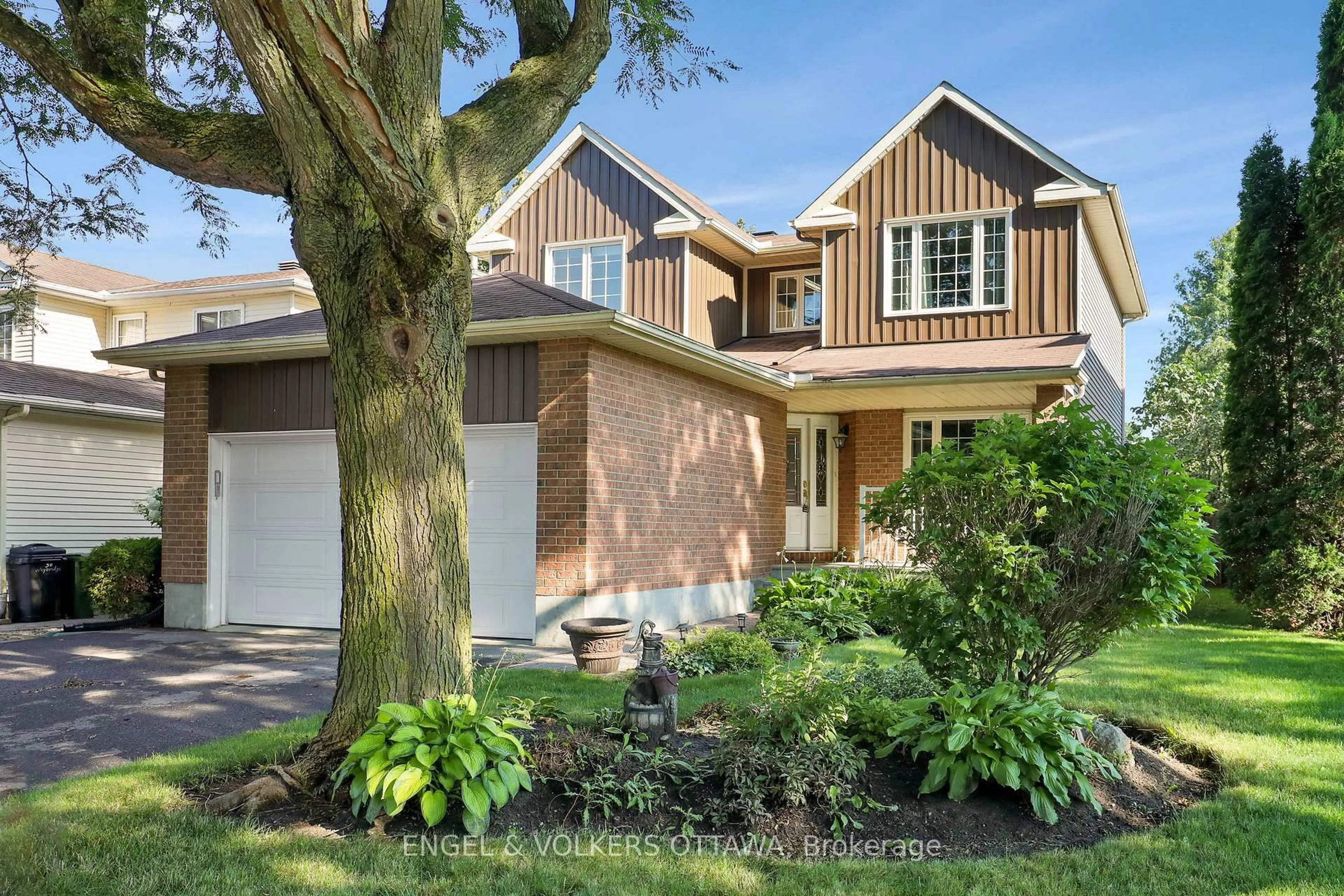 Home with brick exterior material, street for 28 Weybridge Dr, Ottawa Ontario K2J 2Z7