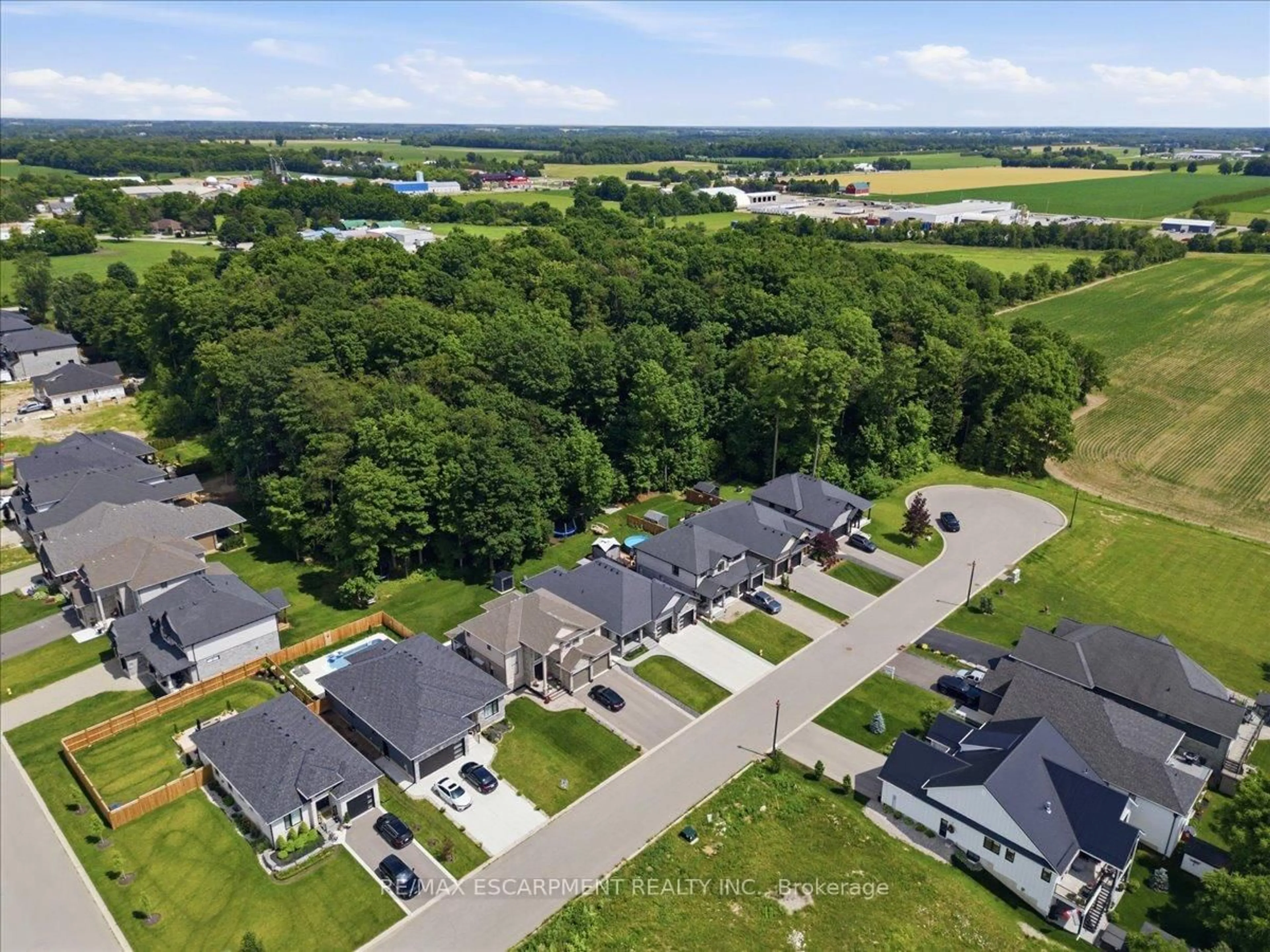 A pic from outside/outdoor area/front of a property/back of a property/a pic from drone, water/lake/river/ocean view for 14 Windywood Lane, Norwich Ontario N0J 1P0