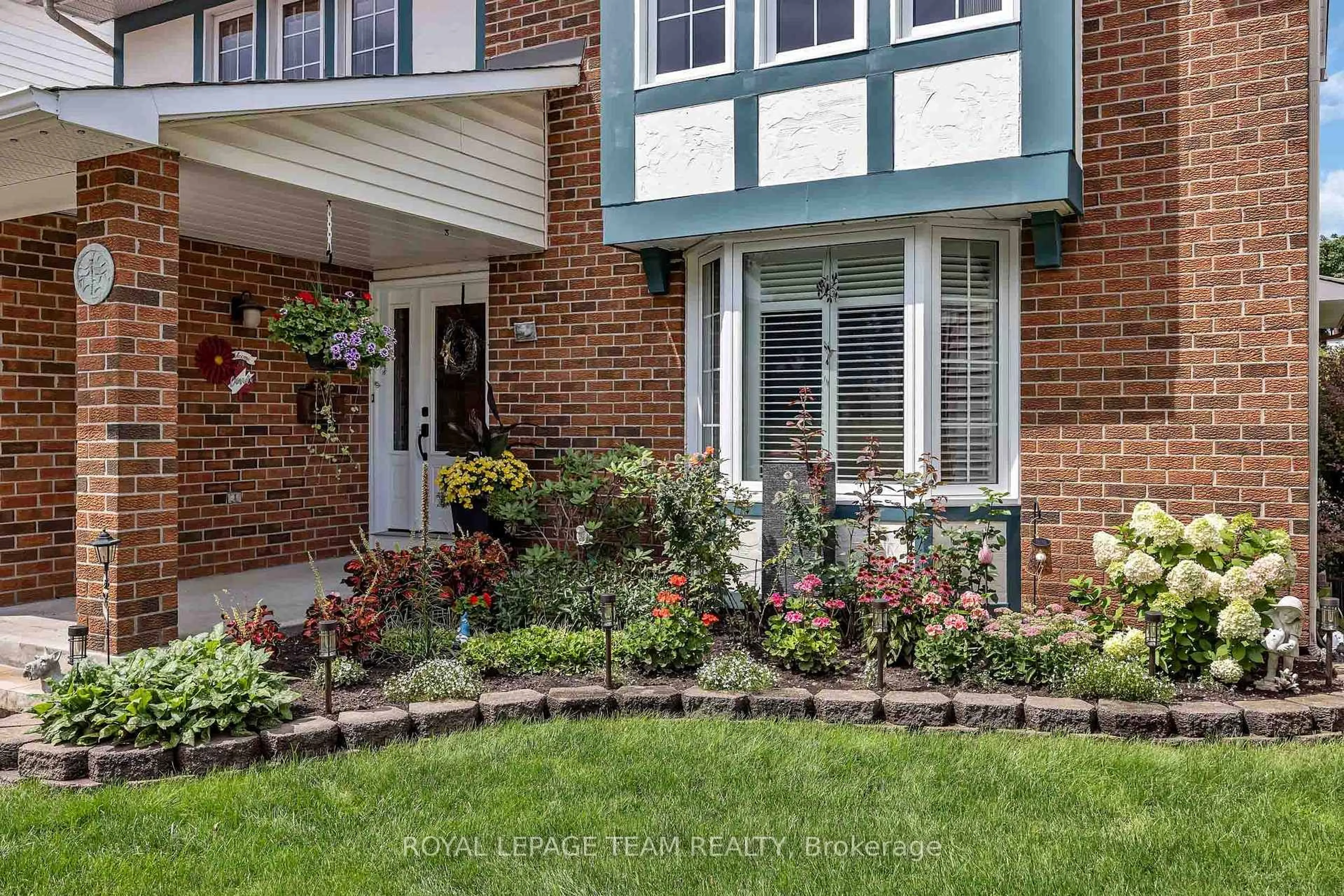 Home with brick exterior material, street for 25 Tamblyn Cres, Kanata Ontario K2L 3A5