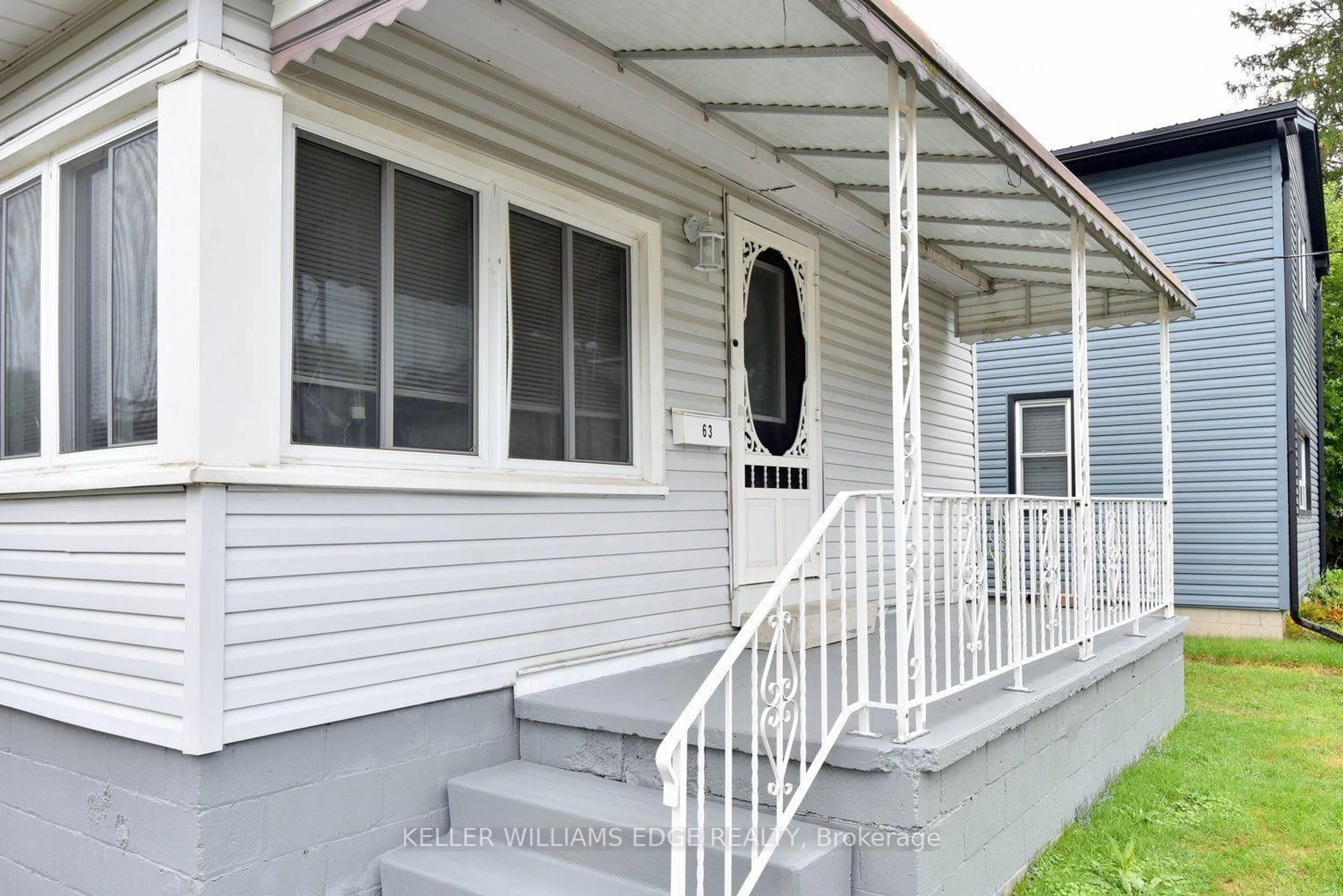 Home with vinyl exterior material, street for 63 Patterson St, Norfolk Ontario N3Y 1J4
