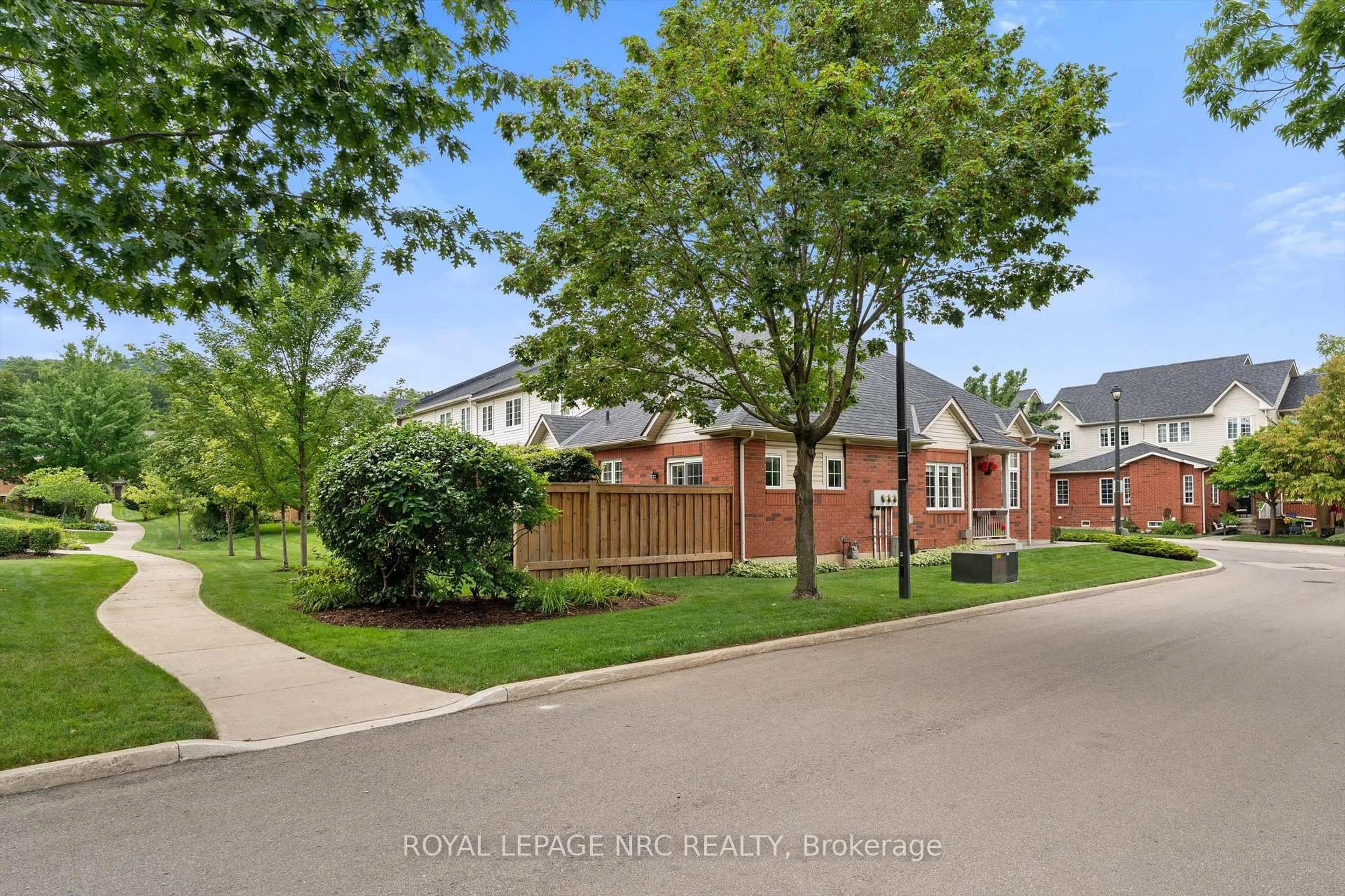 A pic from outside/outdoor area/front of a property/back of a property/a pic from drone, street for 100 Beddoe Dr #77, Hamilton Ontario L8P 4Z2
