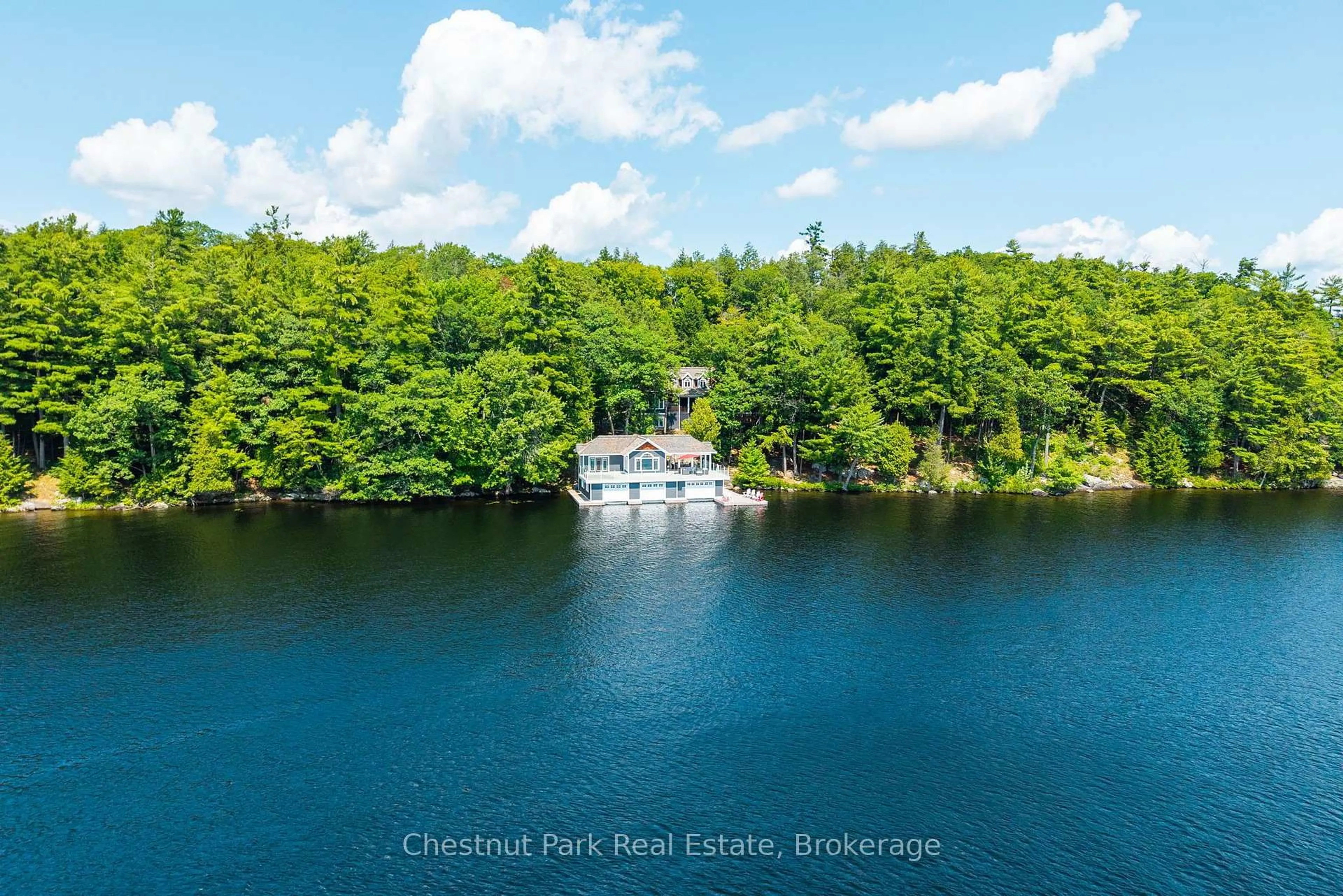 A pic from outside/outdoor area/front of a property/back of a property/a pic from drone, water/lake/river/ocean view for 1152 Trillium Rd, Muskoka Lakes Ontario P0B 1J0