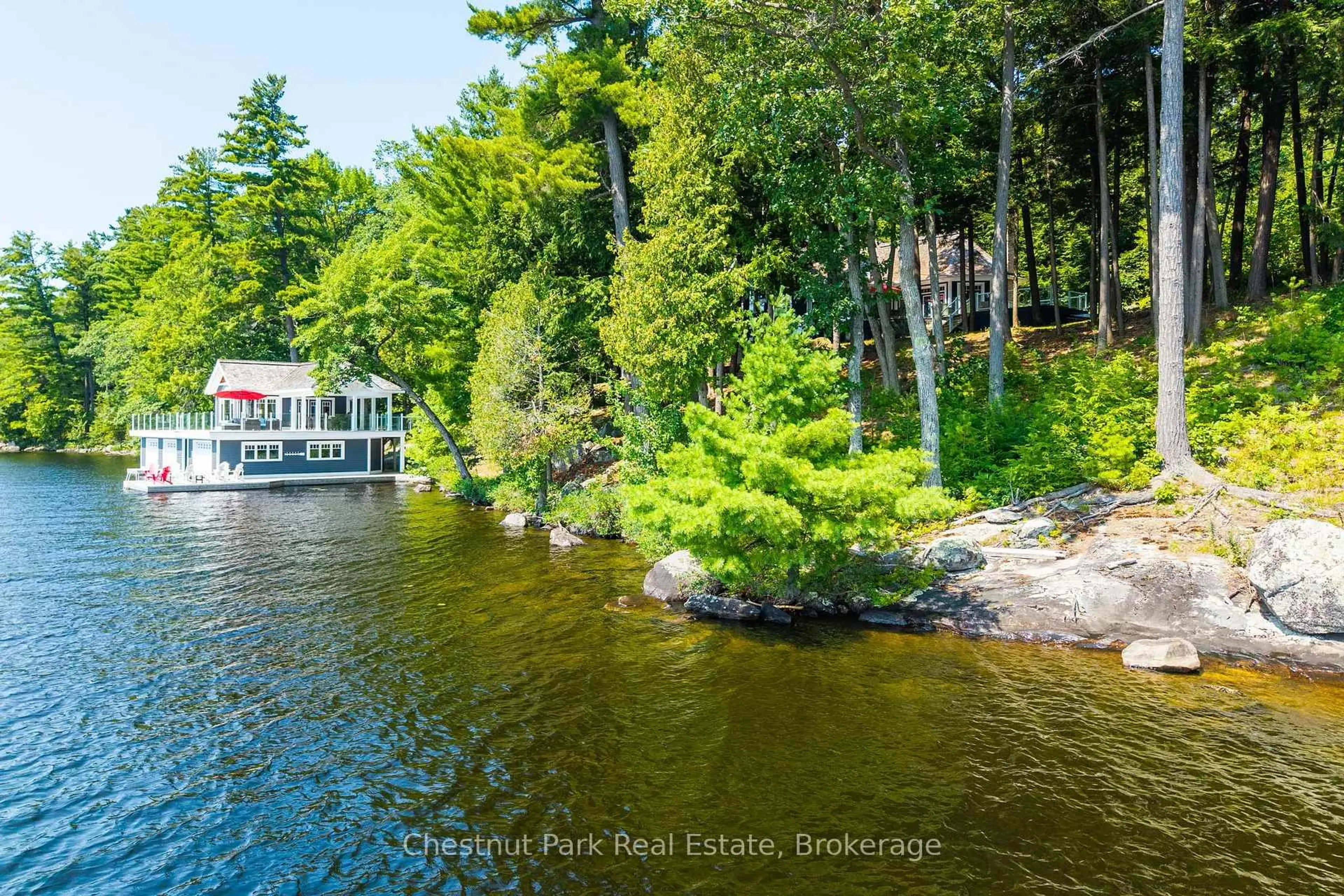A pic from outside/outdoor area/front of a property/back of a property/a pic from drone, water/lake/river/ocean view for 1152 Trillium Rd, Muskoka Lakes Ontario P0B 1J0