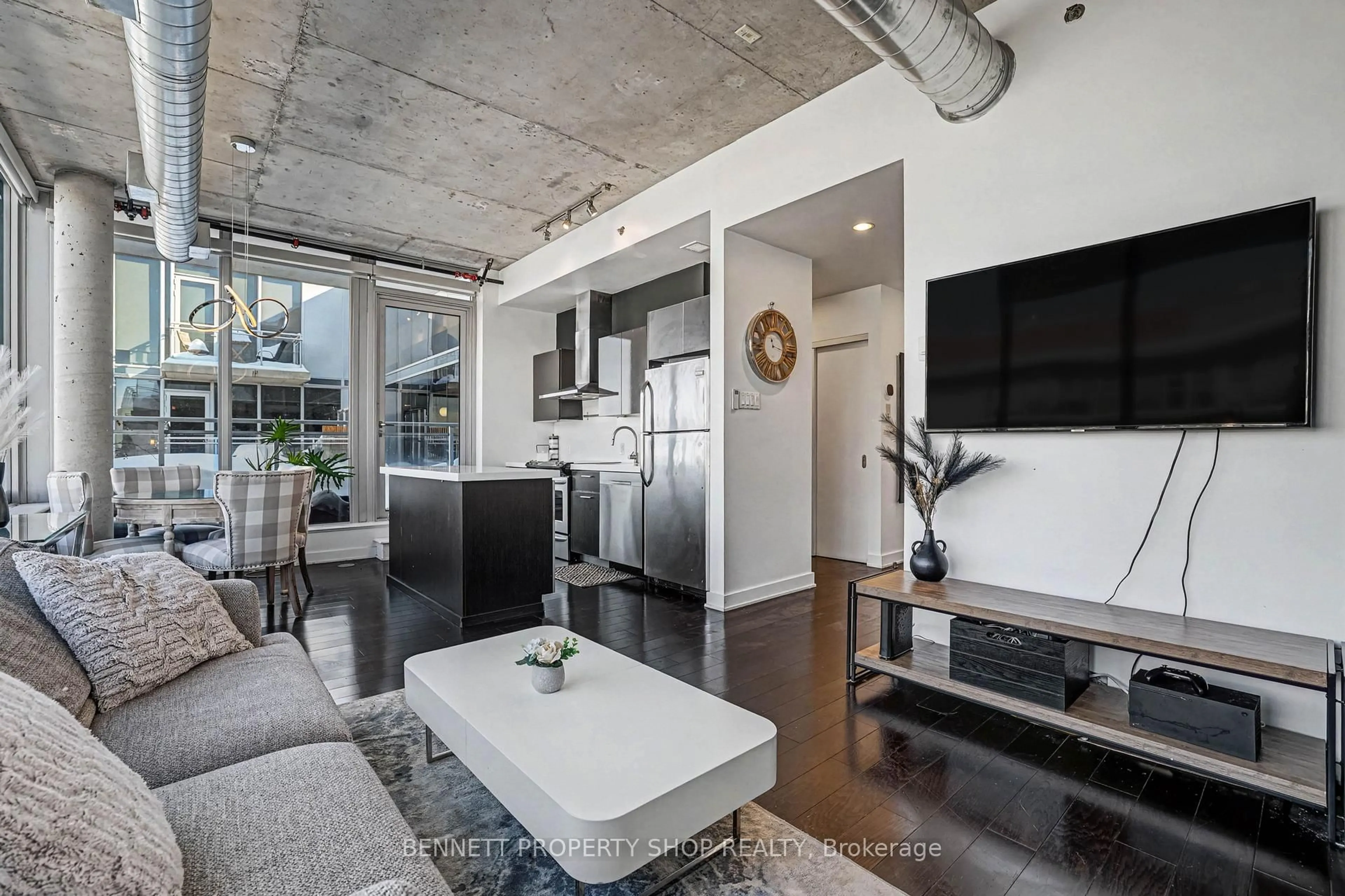 Open concept kitchen, cement floor for 360 McLeod St #811, Ottawa Ontario K2P 1A9