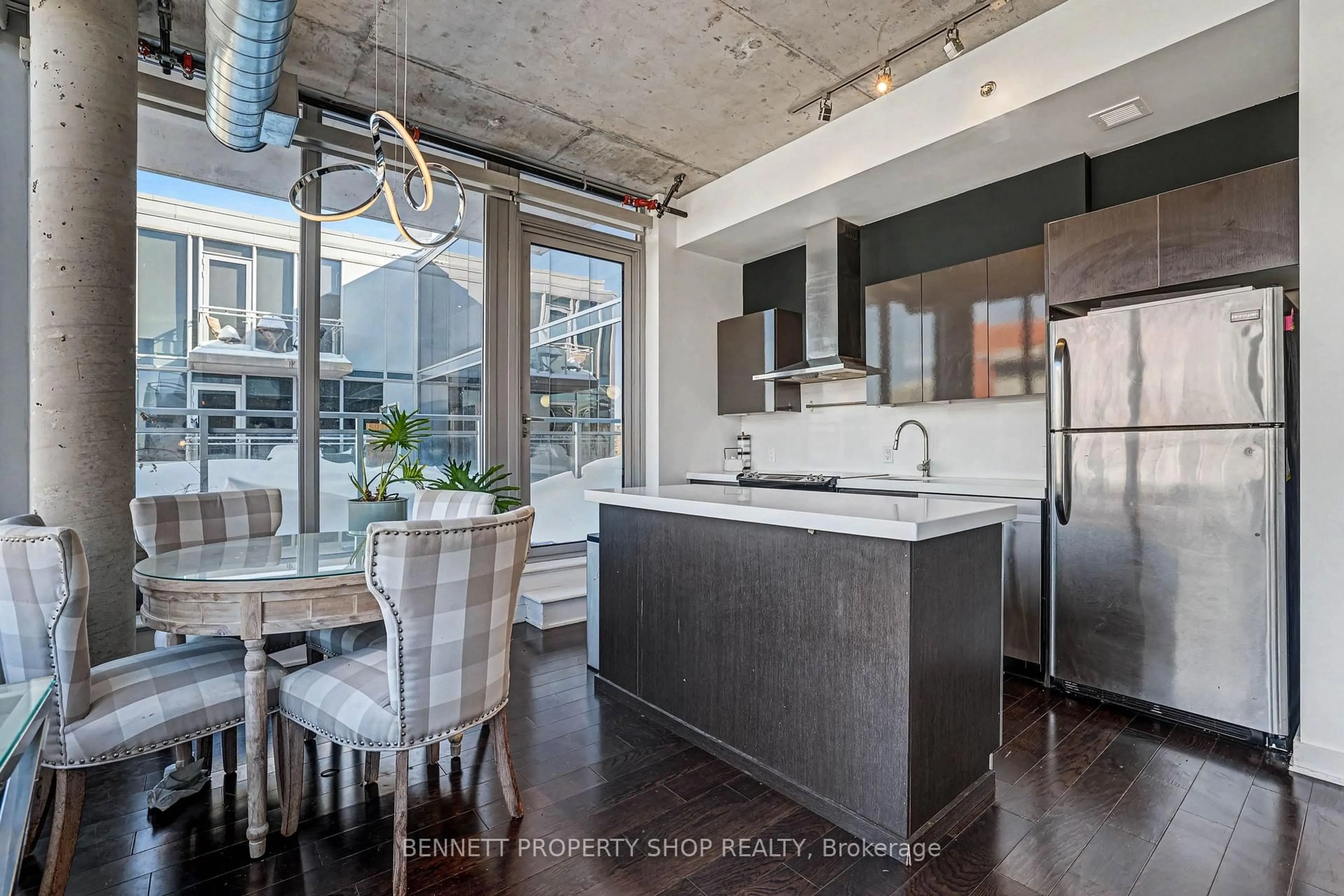 Open concept kitchen, cement floor for 360 McLeod St #811, Ottawa Ontario K2P 1A9