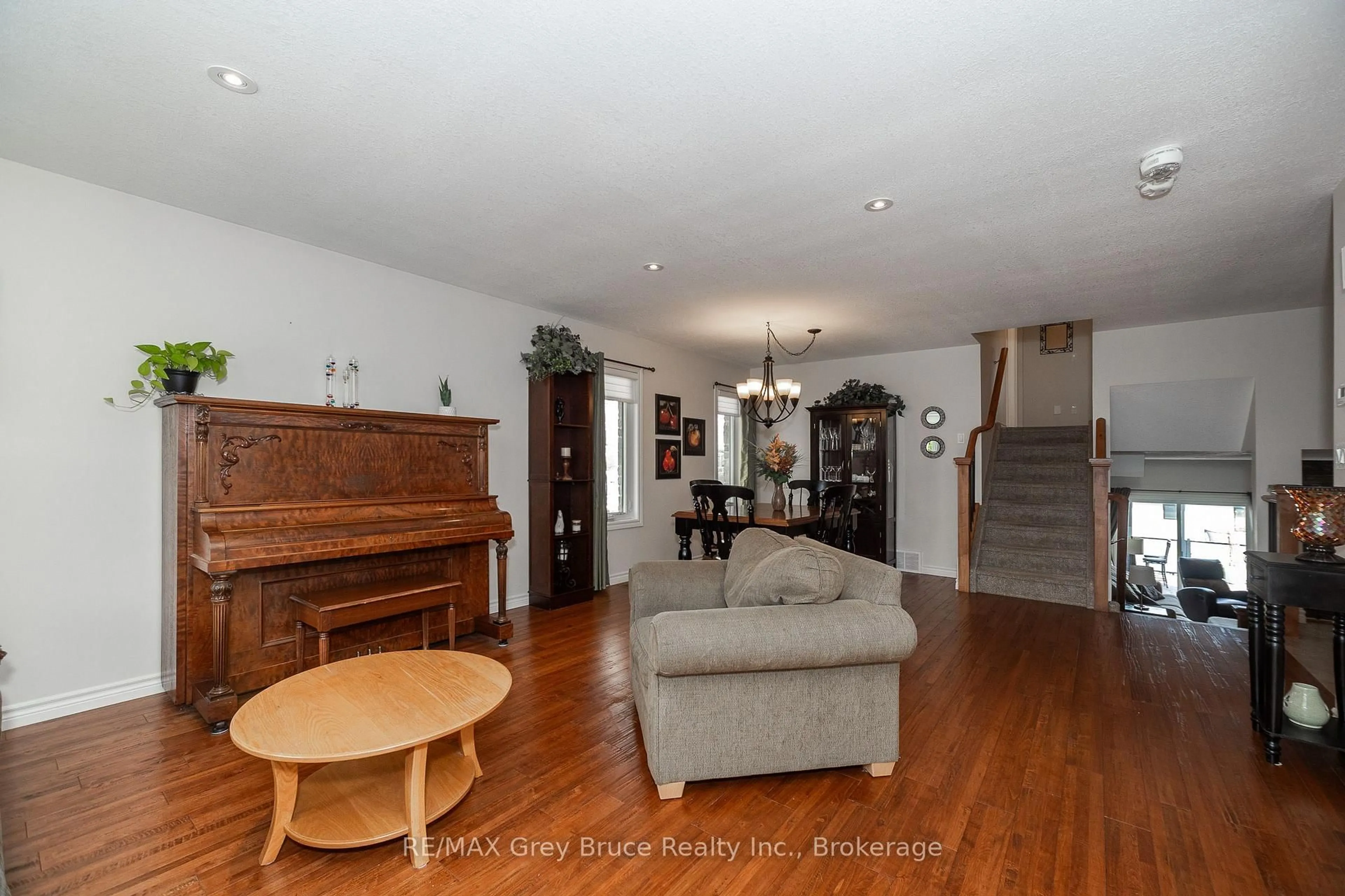 Living room with furniture, wood/laminate floor for 2591 7th Ave, Owen Sound Ontario N4K 6V1