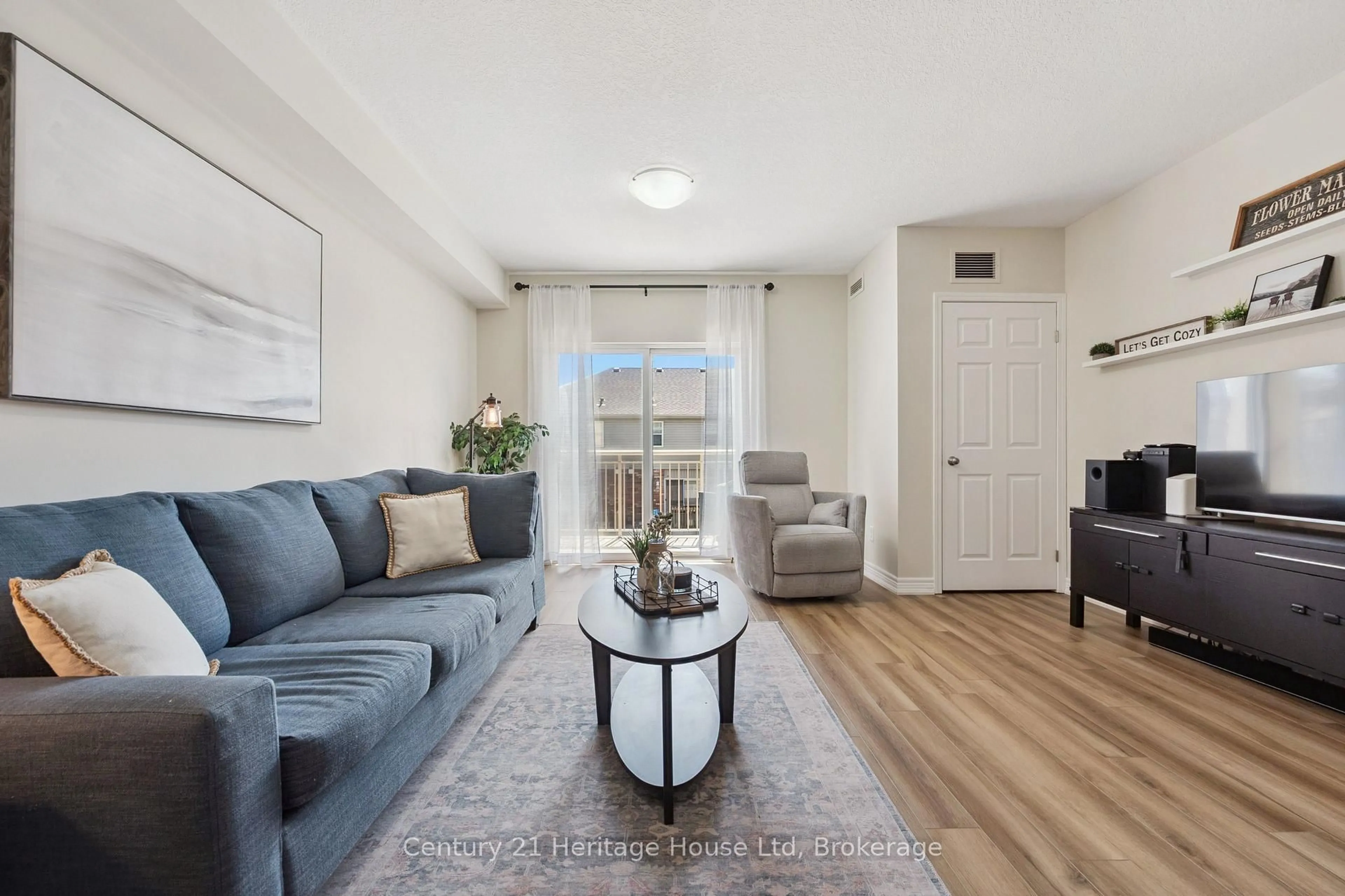 Living room with furniture, unknown for 901 Paisley Rd #207, Guelph Ontario N1K 0A7