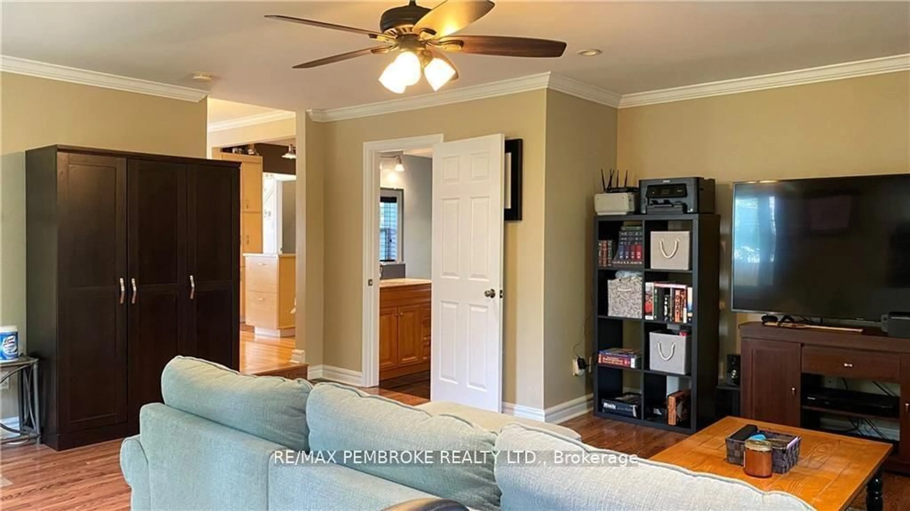Living room with furniture, wood/laminate floor for 16 Wolfe Ave, Deep River Ontario K0J 1P0