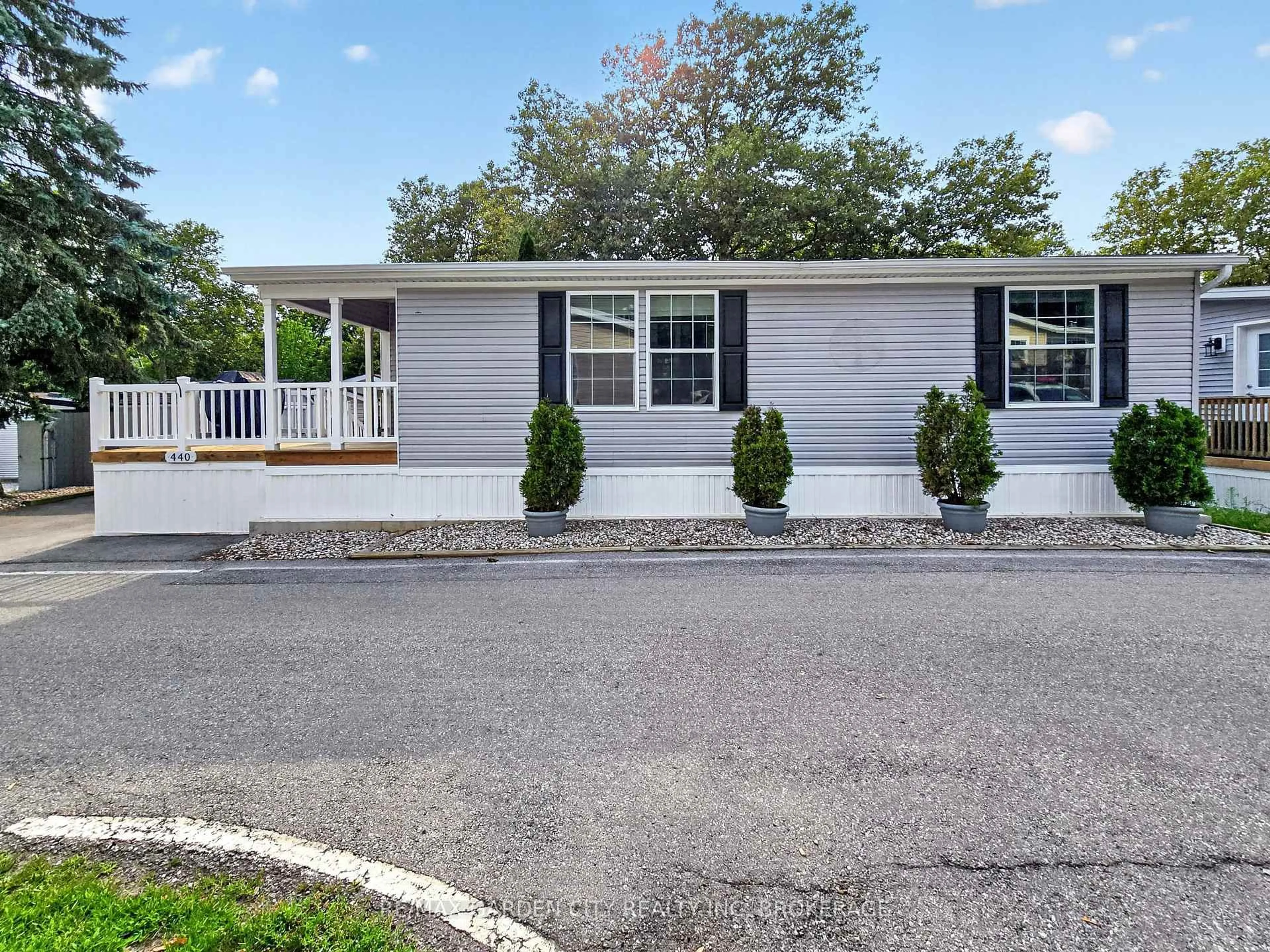 Home with vinyl exterior material, street for 23 Four Mile Creek Rd #440, Niagara-on-the-Lake Ontario L0S 1J1