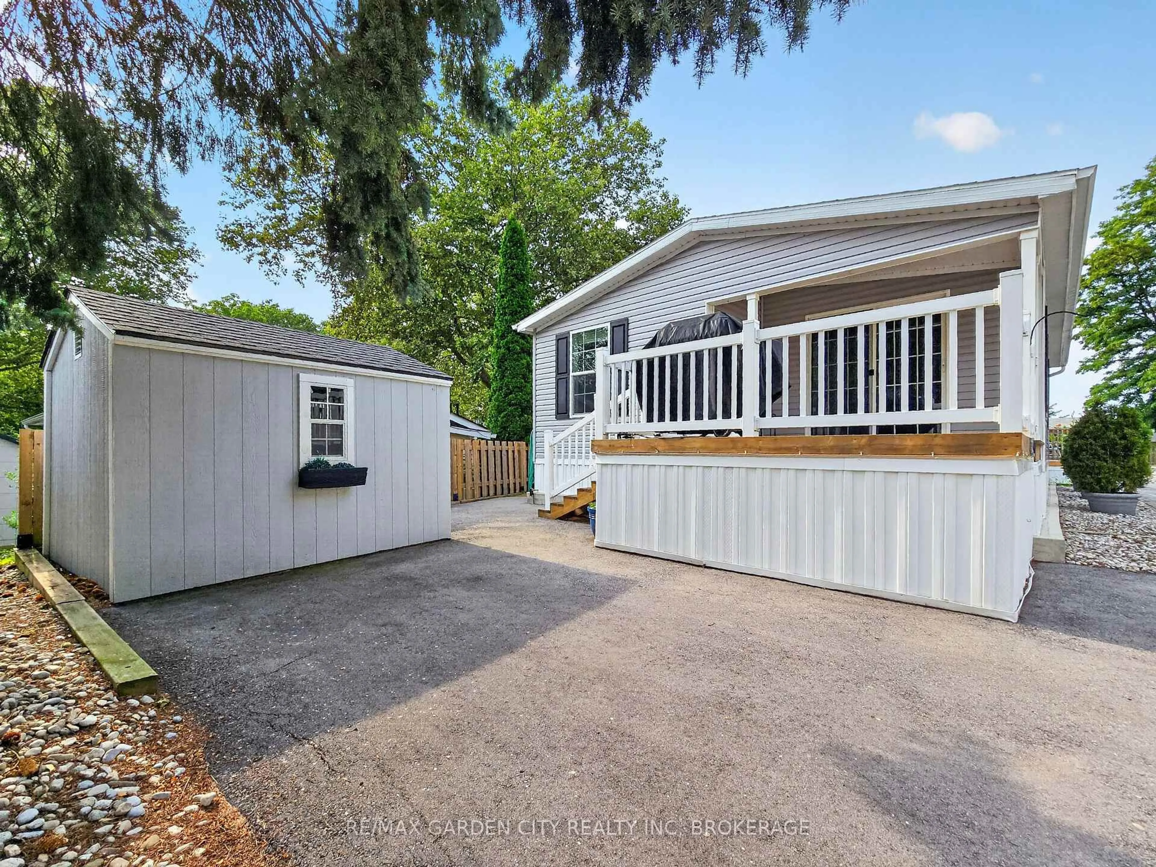 Home with vinyl exterior material, street for 23 Four Mile Creek Rd #440, Niagara-on-the-Lake Ontario L0S 1J1