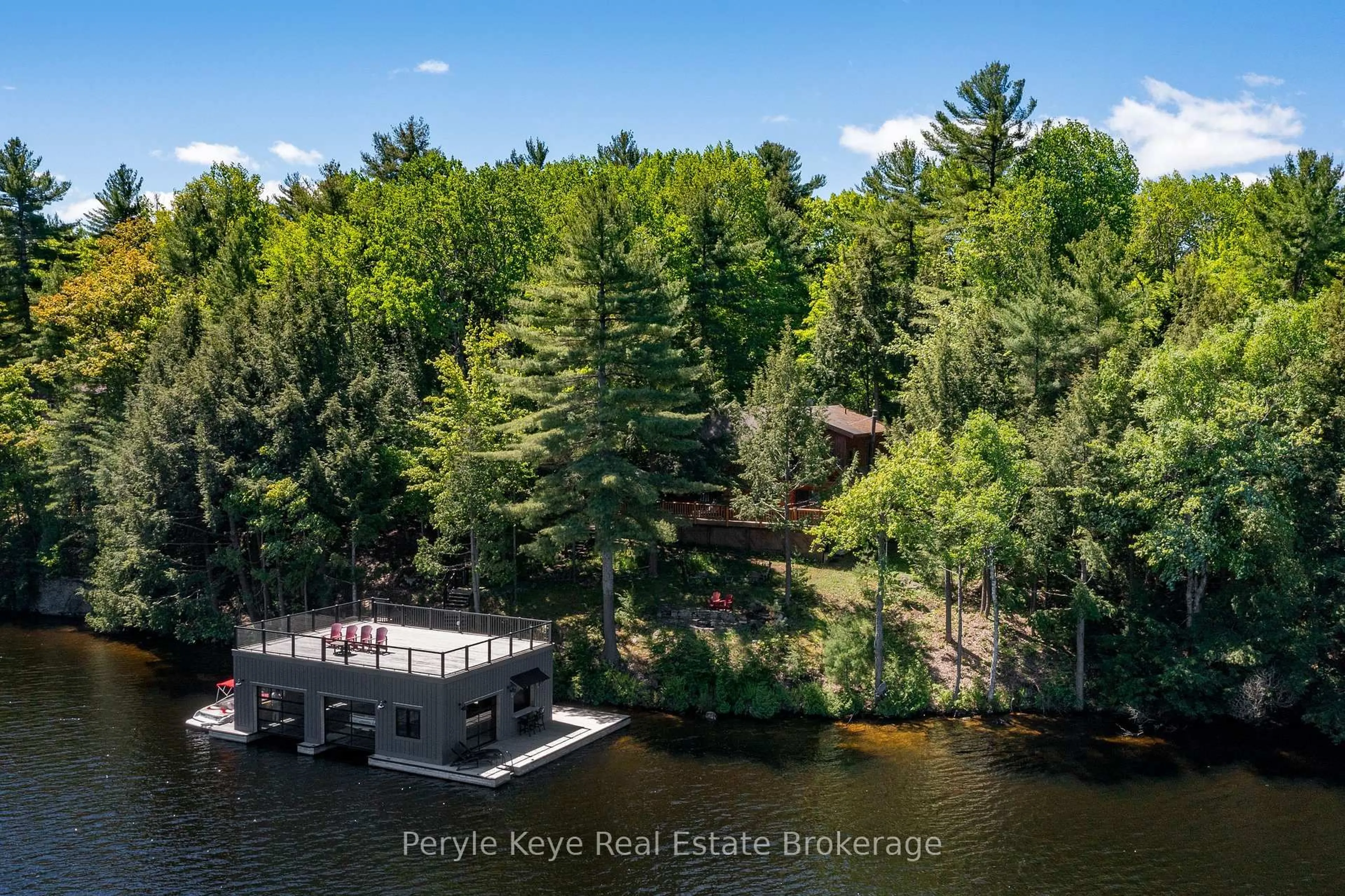 A pic from outside/outdoor area/front of a property/back of a property/a pic from drone, water/lake/river/ocean view for 22-26 Taylor Island, Gravenhurst Ontario P1P 1R2