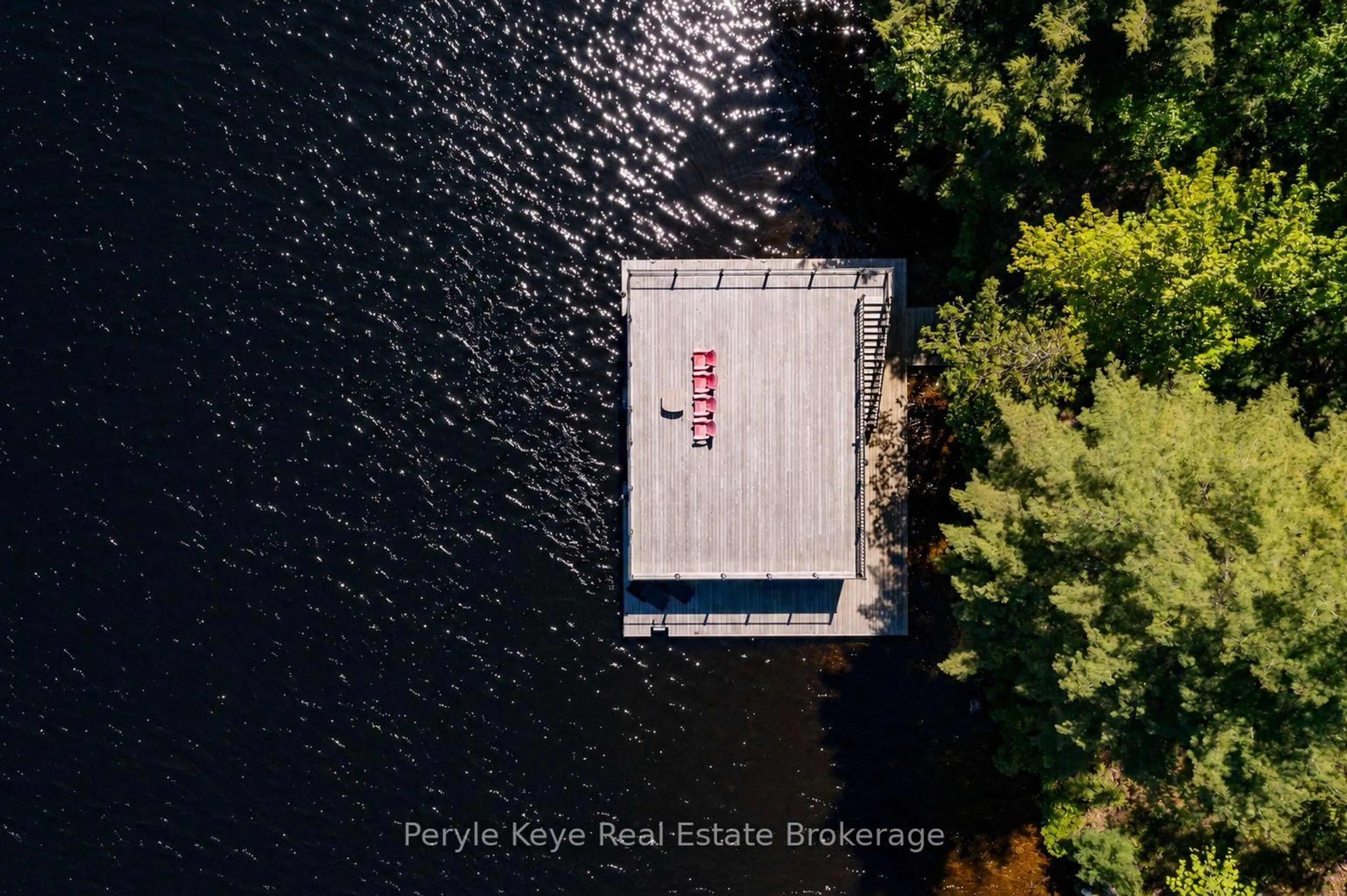 A pic from outside/outdoor area/front of a property/back of a property/a pic from drone, water/lake/river/ocean view for 22-26 Taylor Island, Gravenhurst Ontario P1P 1R2