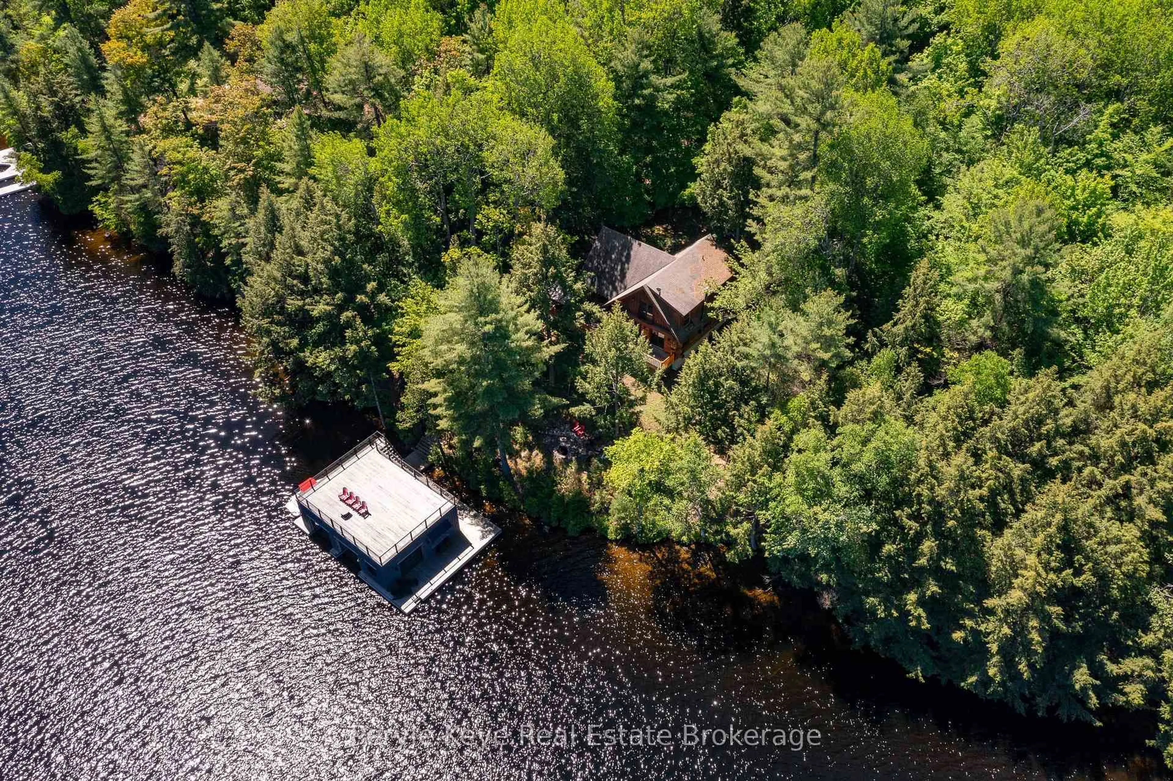 A pic from outside/outdoor area/front of a property/back of a property/a pic from drone, water/lake/river/ocean view for 22-26 Taylor Island, Gravenhurst Ontario P1P 1R2