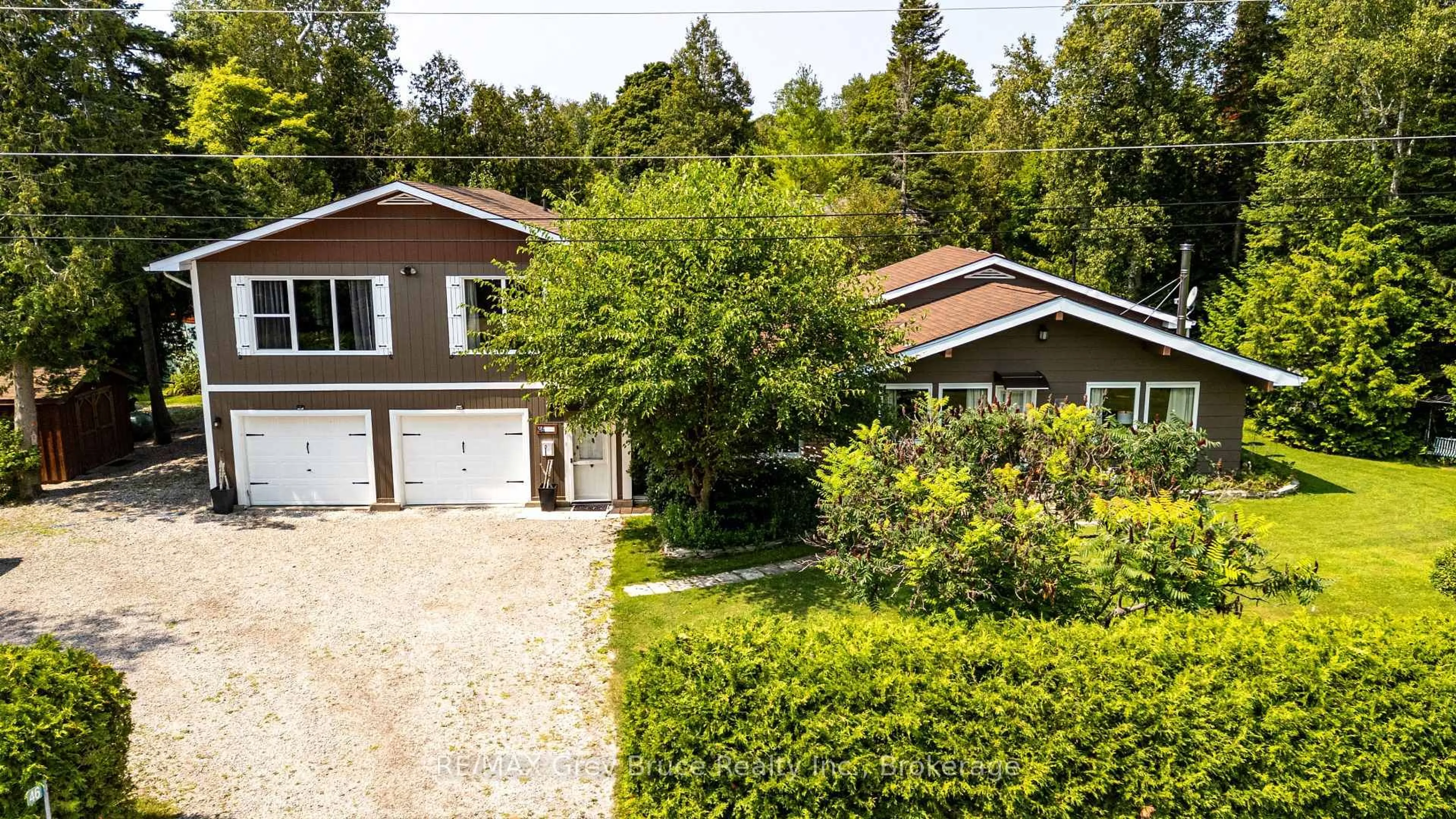A pic from outside/outdoor area/front of a property/back of a property/a pic from drone, street for 46 Shamrock Blvd, South Bruce Peninsula Ontario N0H 2T0