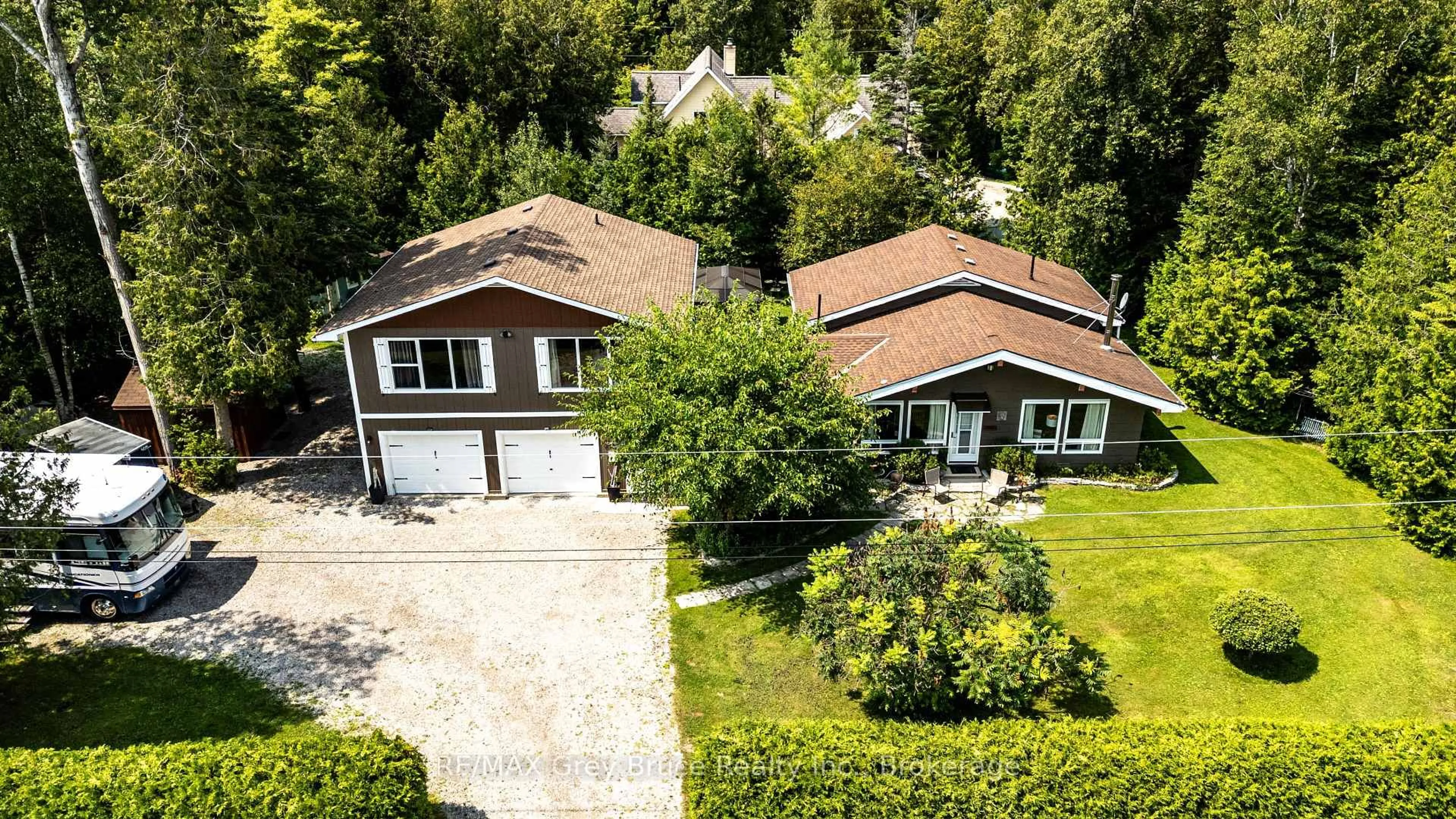 A pic from outside/outdoor area/front of a property/back of a property/a pic from drone, street for 46 Shamrock Blvd, South Bruce Peninsula Ontario N0H 2T0