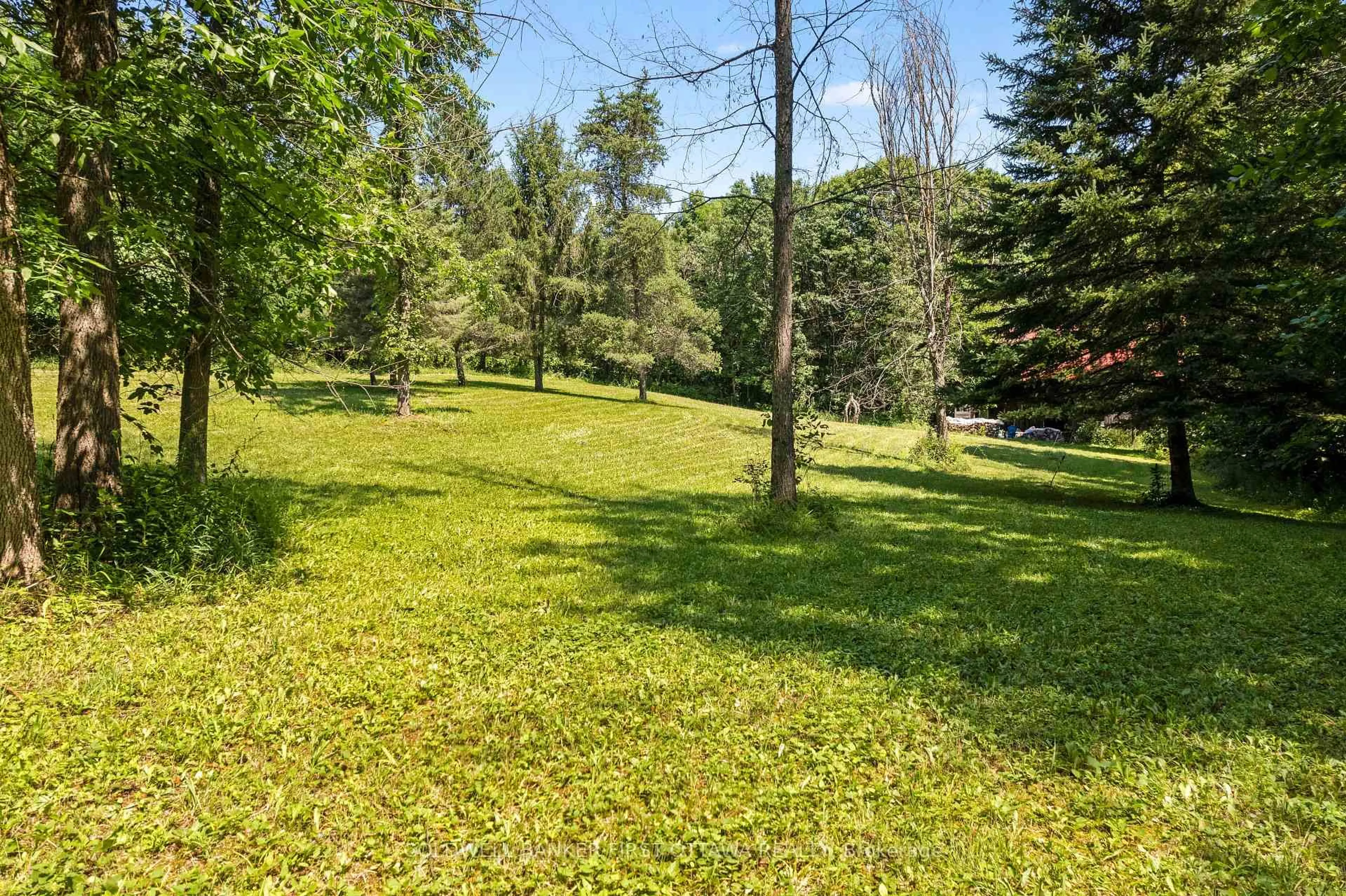 A pic from outside/outdoor area/front of a property/back of a property/a pic from drone, forest/trees view for 105 Purdons Bay Rd, Mcdonalds Corners Ontario K0G 1M0