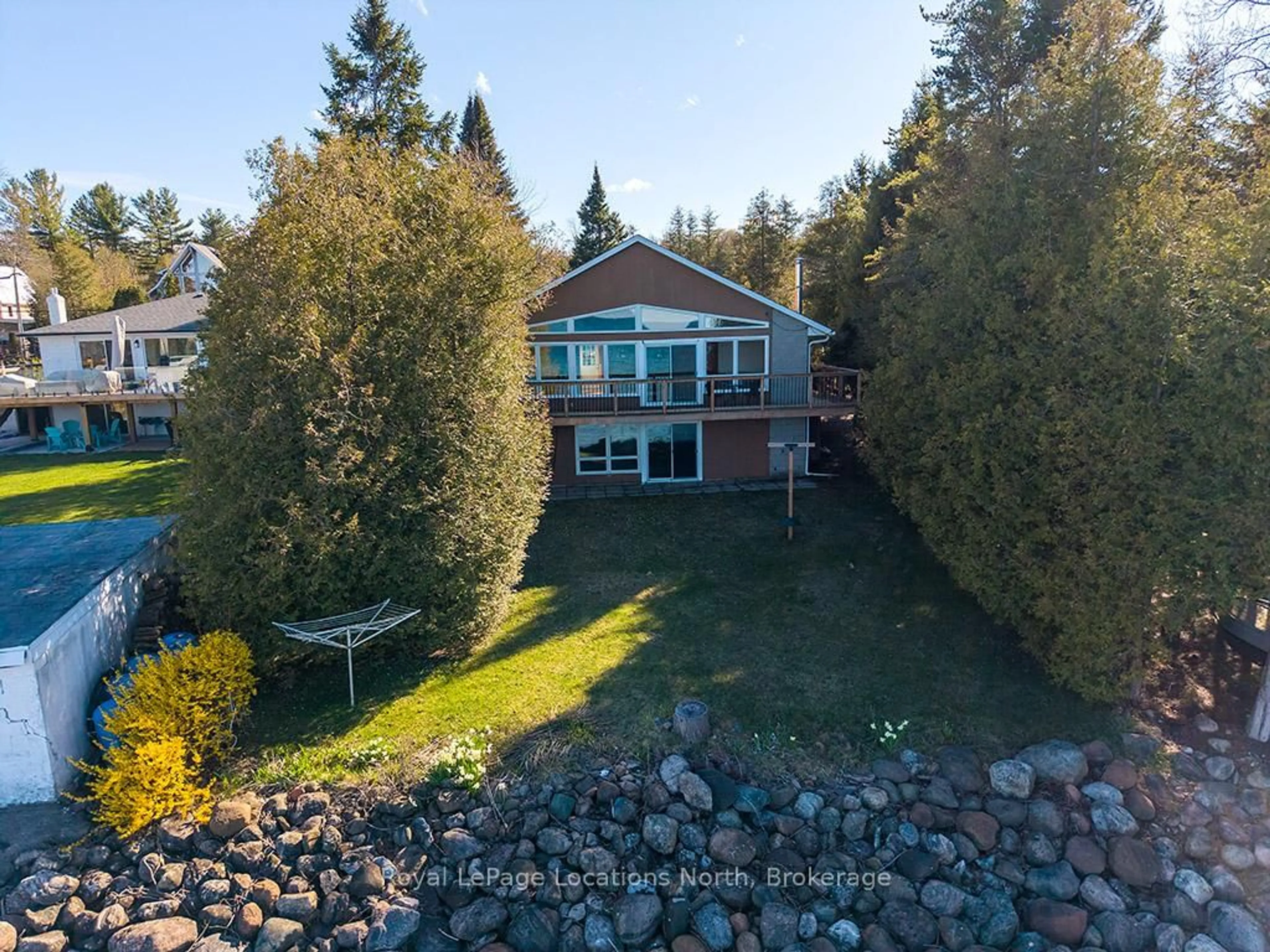 A pic from outside/outdoor area/front of a property/back of a property/a pic from drone, water/lake/river/ocean view for 227 Sunset Blvd, Blue Mountains Ontario N0H 2P0