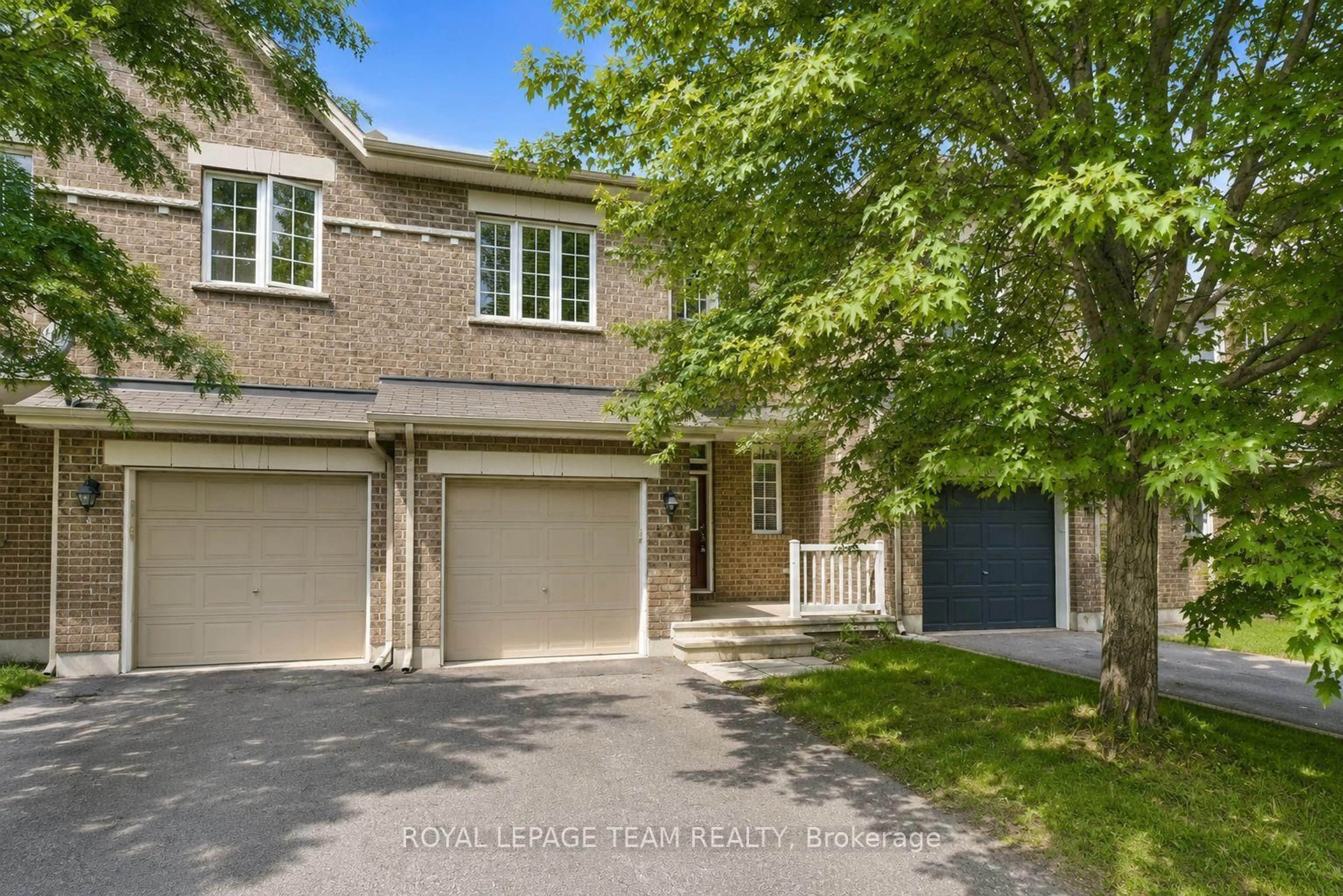 Home with brick exterior material, street for 239 Tandalee Cres, Ottawa Ontario K2M 0A2