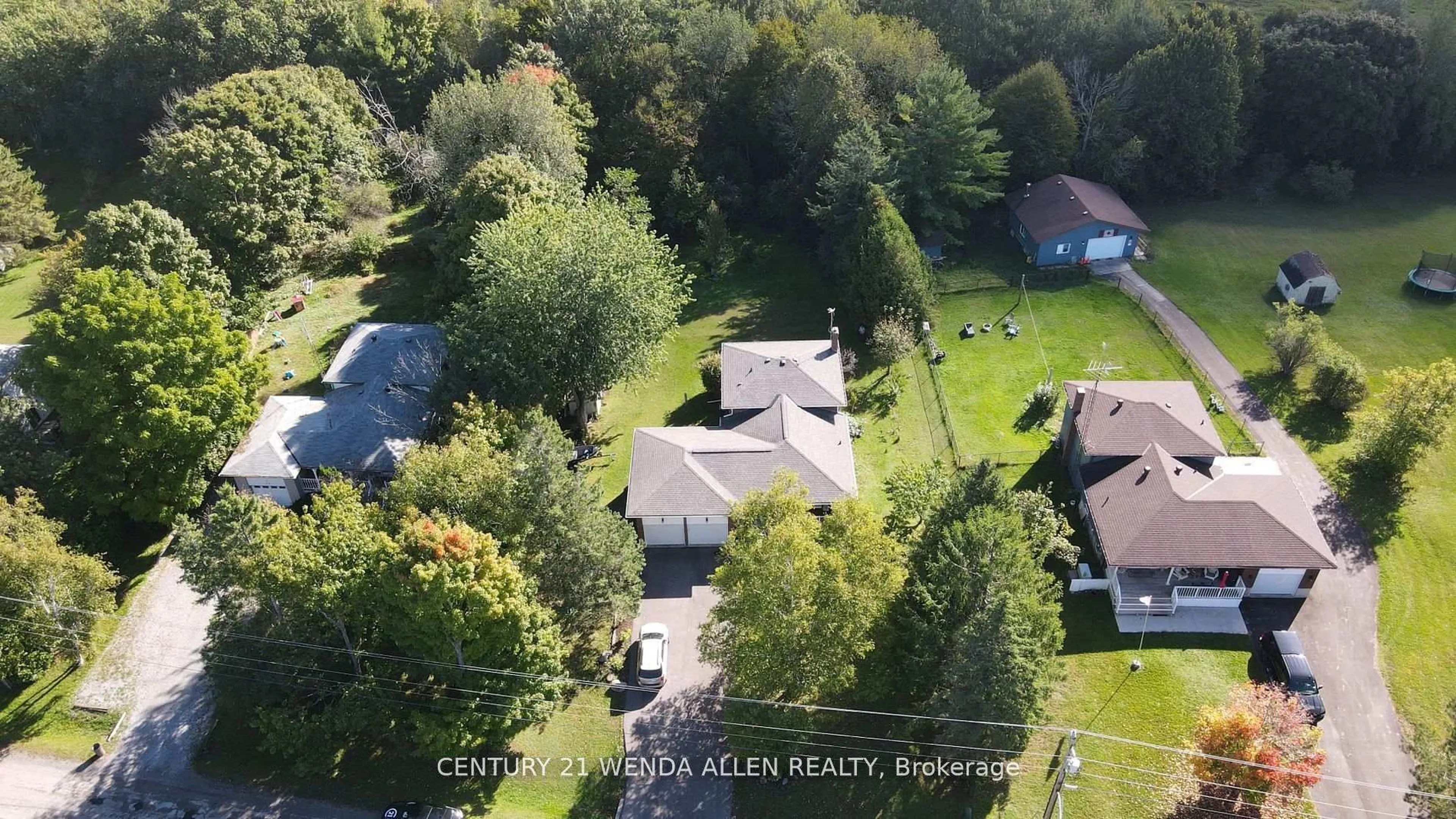A pic from outside/outdoor area/front of a property/back of a property/a pic from drone, unknown for 14 Manvers Dr, Kawartha Lakes Ontario L0B 1K0