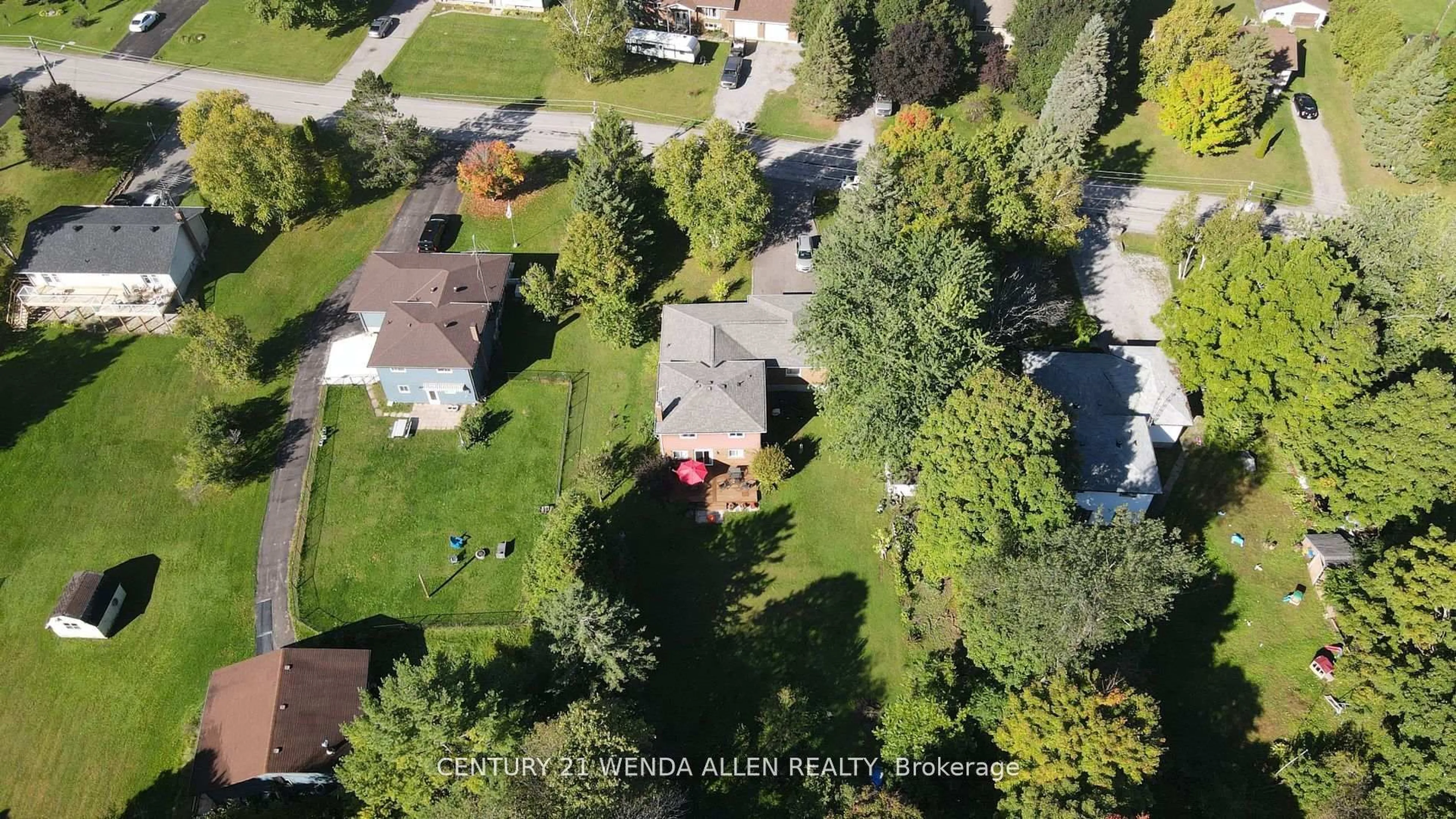 A pic from outside/outdoor area/front of a property/back of a property/a pic from drone, street for 14 Manvers Dr, Kawartha Lakes Ontario L0B 1K0