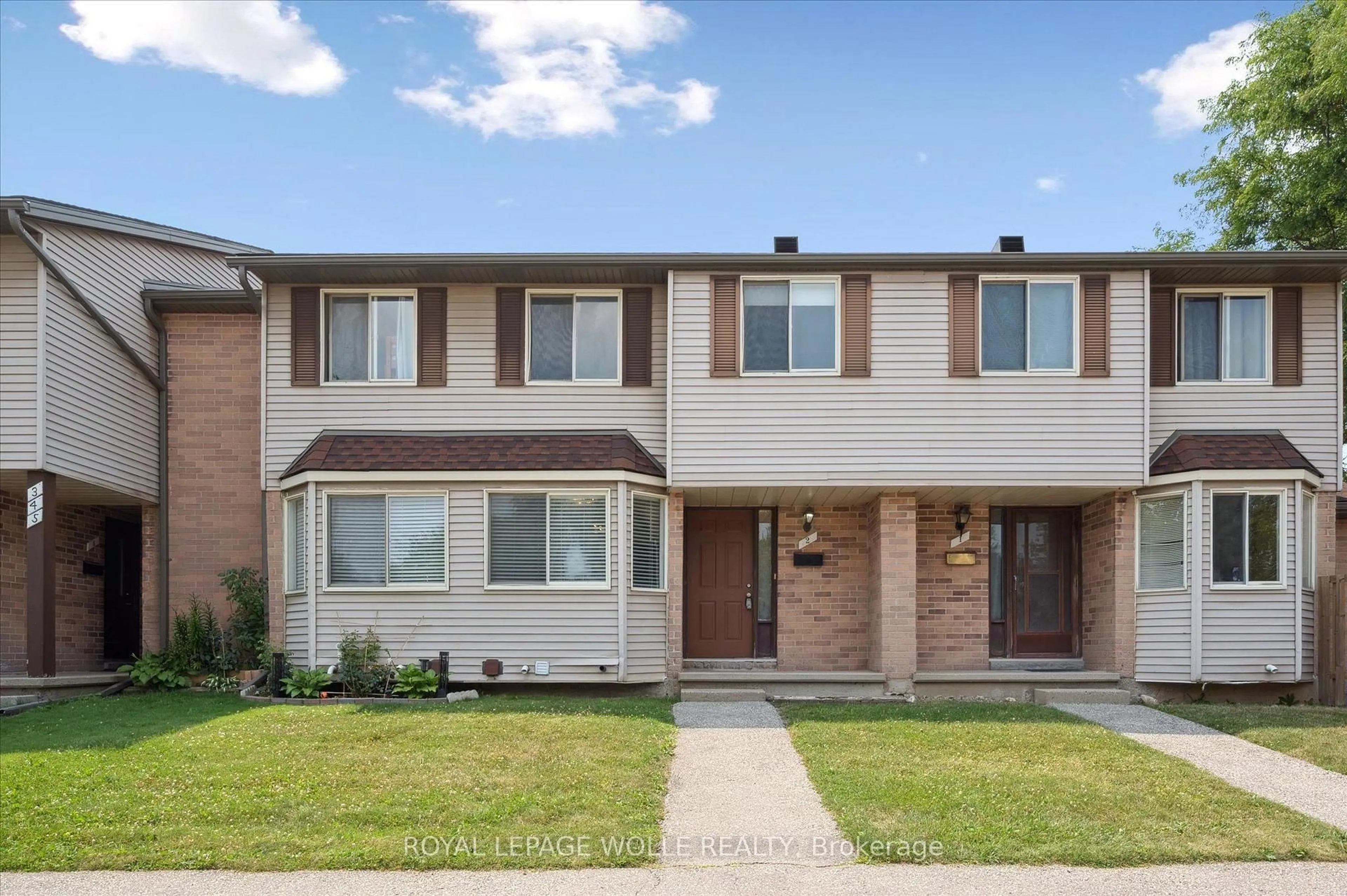 Home with brick exterior material, street for 750 Erinbrook Dr #2, Kitchener Ontario N2E 2S7