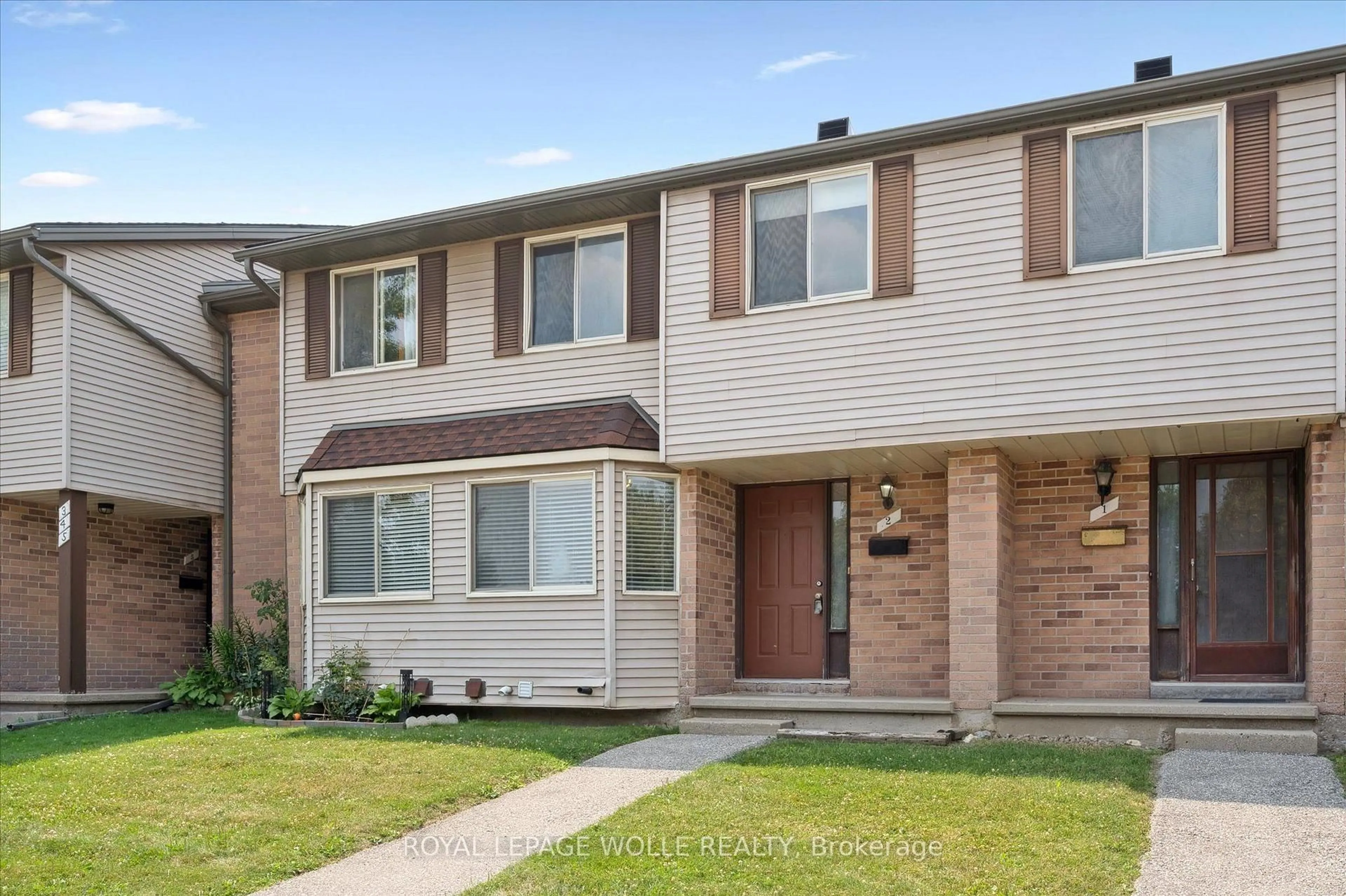 Home with brick exterior material, street for 750 Erinbrook Dr #2, Kitchener Ontario N2E 2S7