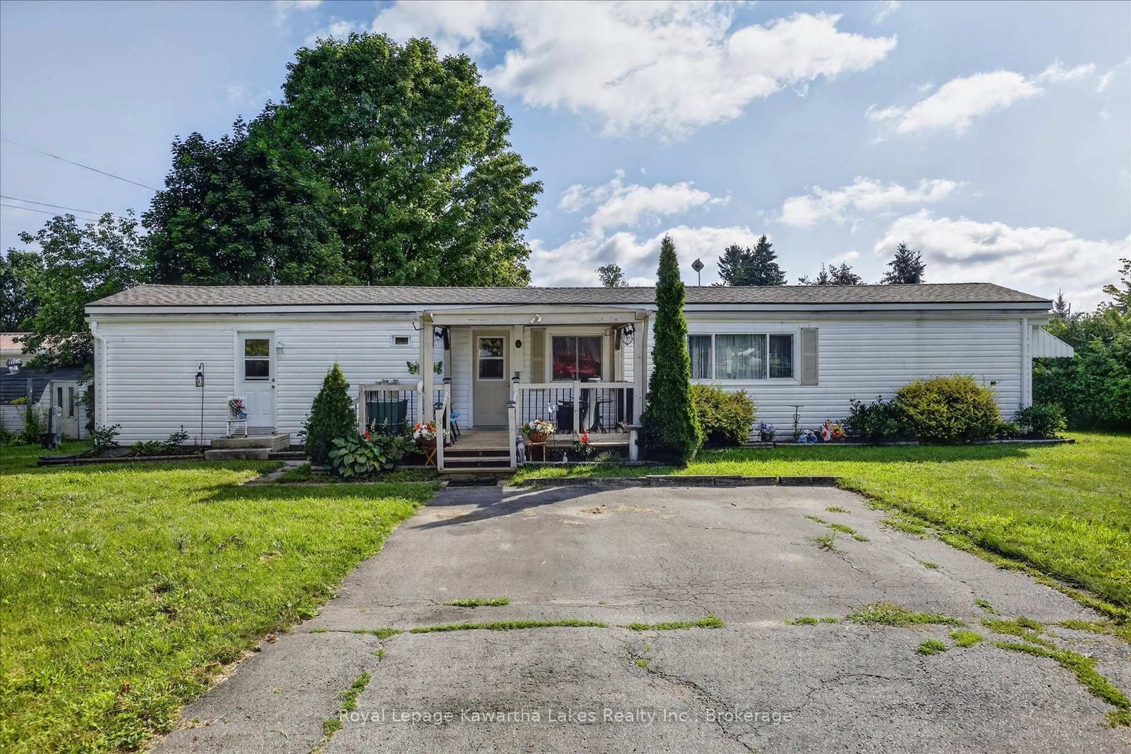 Home with vinyl exterior material, street for 3 Ops Dr, Kawartha Lakes Ontario K9V 0H5