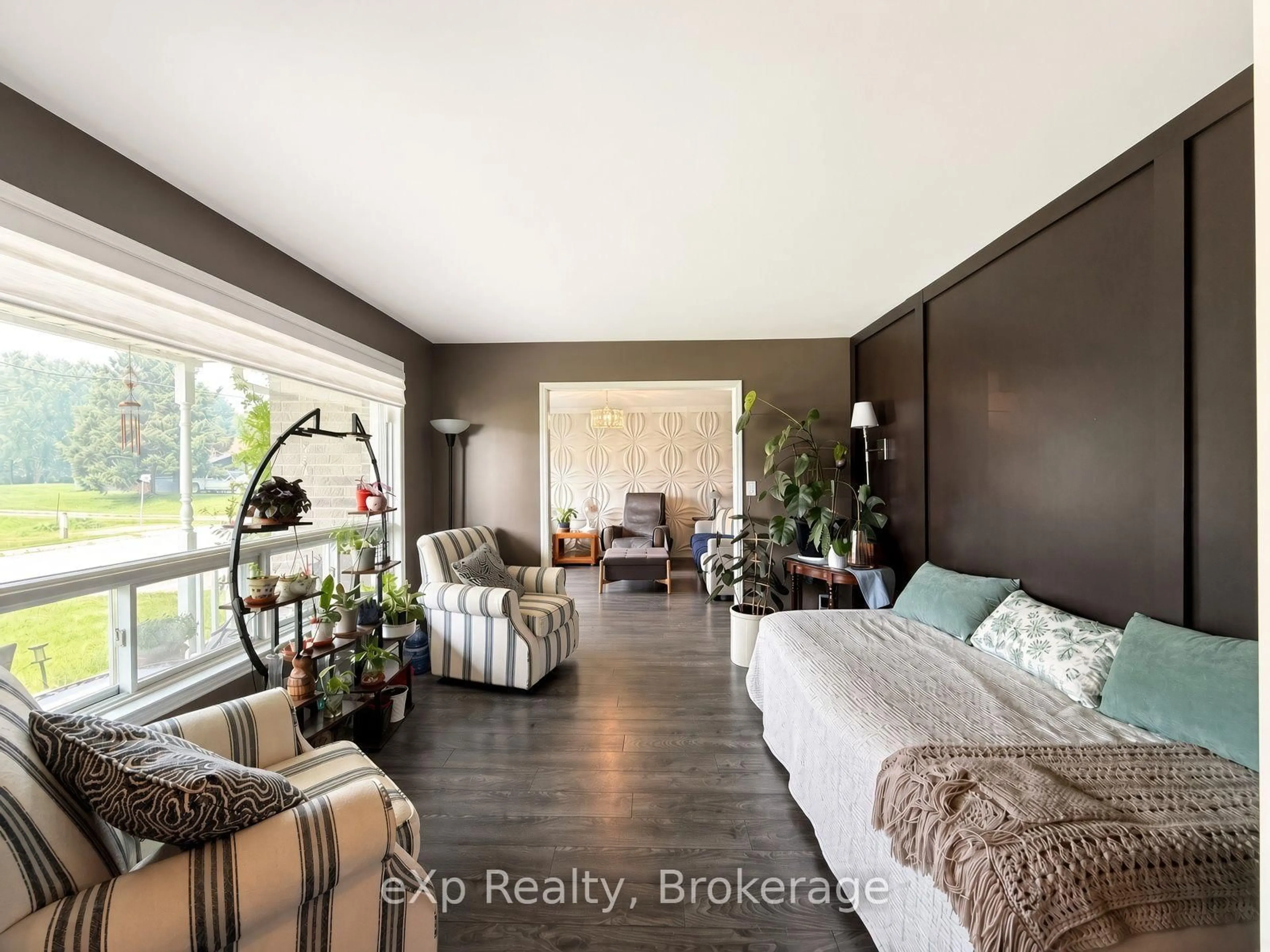 Living room with furniture, wood/laminate floor for 23 12th St, Arran-Elderslie Ontario N0G 1L0