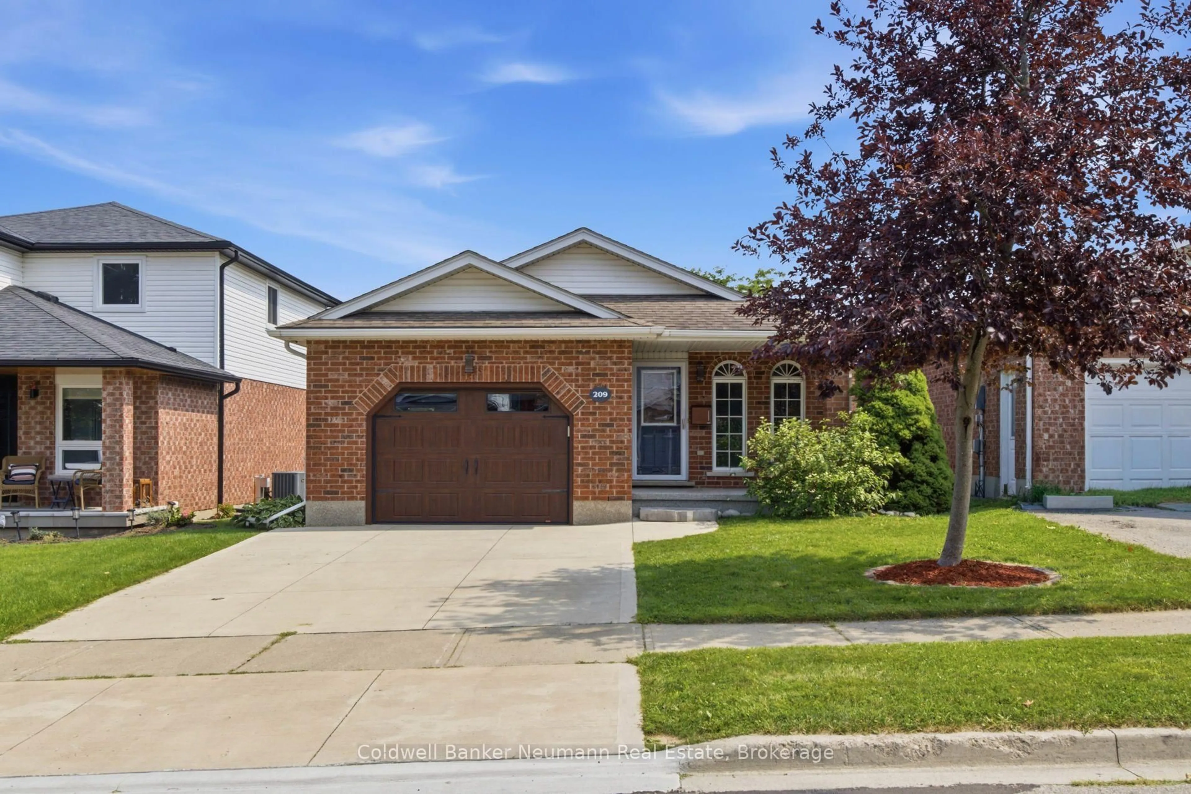 Home with brick exterior material, street for 209 Country Club Dr, Guelph Ontario N1E 3K8