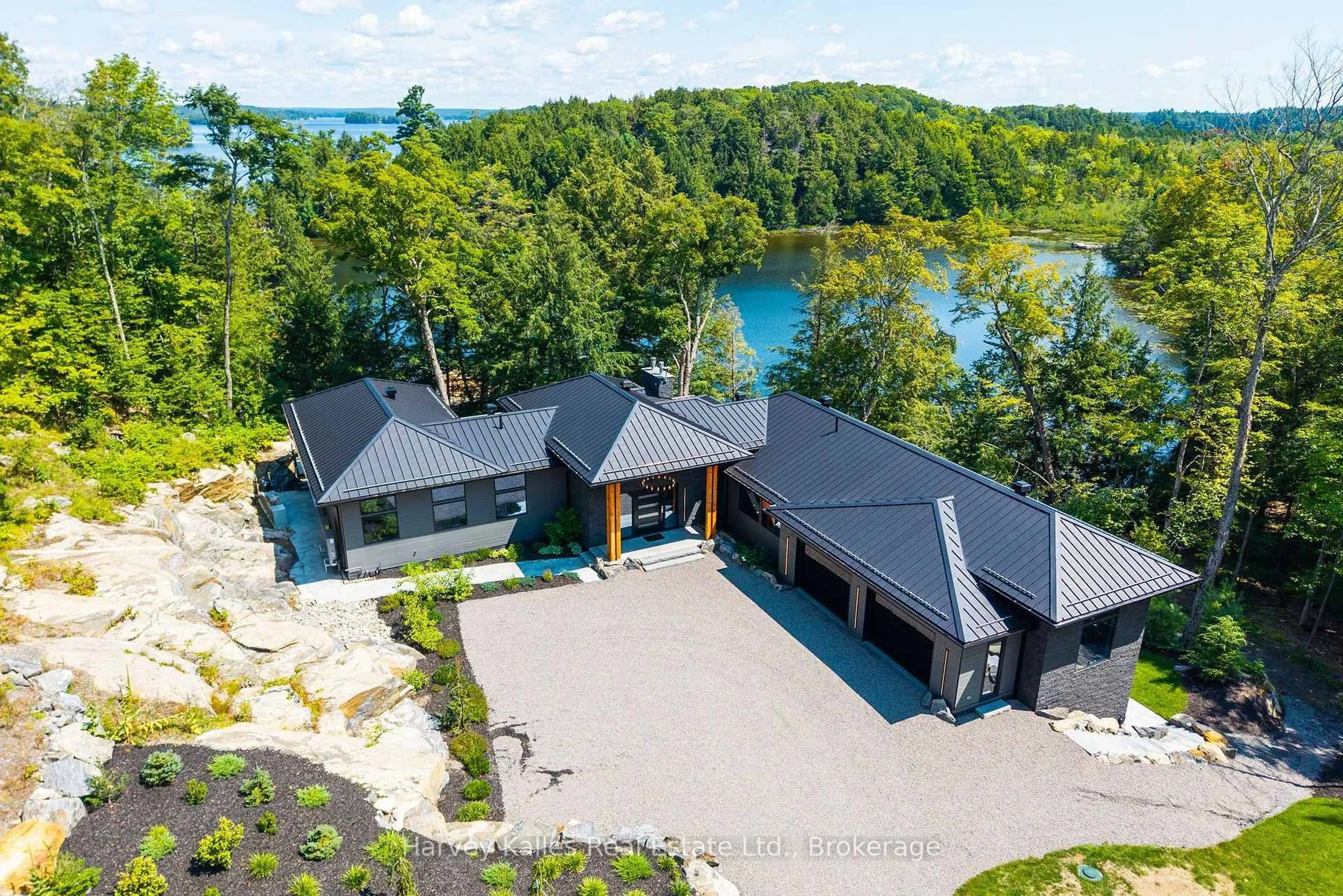 A pic from outside/outdoor area/front of a property/back of a property/a pic from drone, water/lake/river/ocean view for 1013 Halls Rd #2, Muskoka Lakes Ontario P0B 1J0