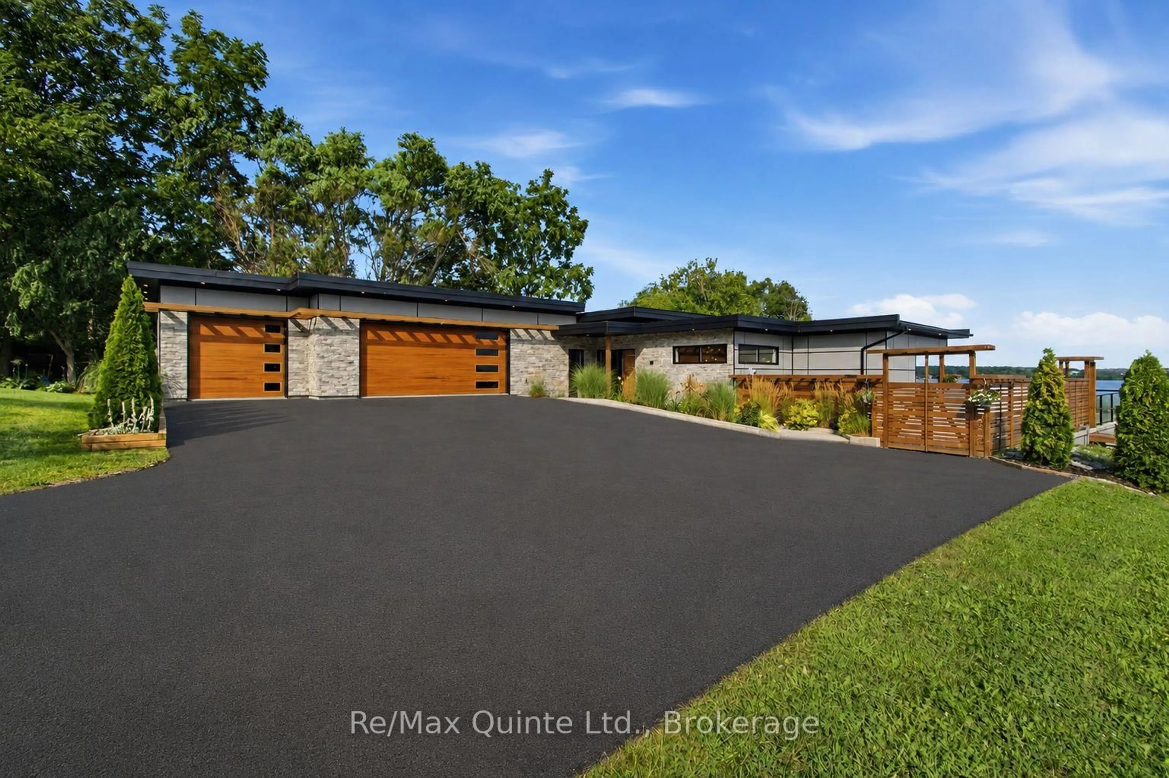 A pic from outside/outdoor area/front of a property/back of a property/a pic from drone, street for 8 Bayview Point Rd, Prince Edward County Ontario K8N 4Z1